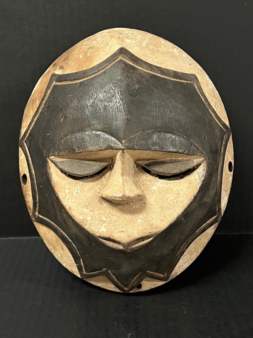 Teke Mask: African Tribal Art Teke Mask. The dimension is 10 inches high x 8 inches wide. The shipping cost for domestic is $30.00 flat rate shipping within the Continental US including handling, packing and ins
