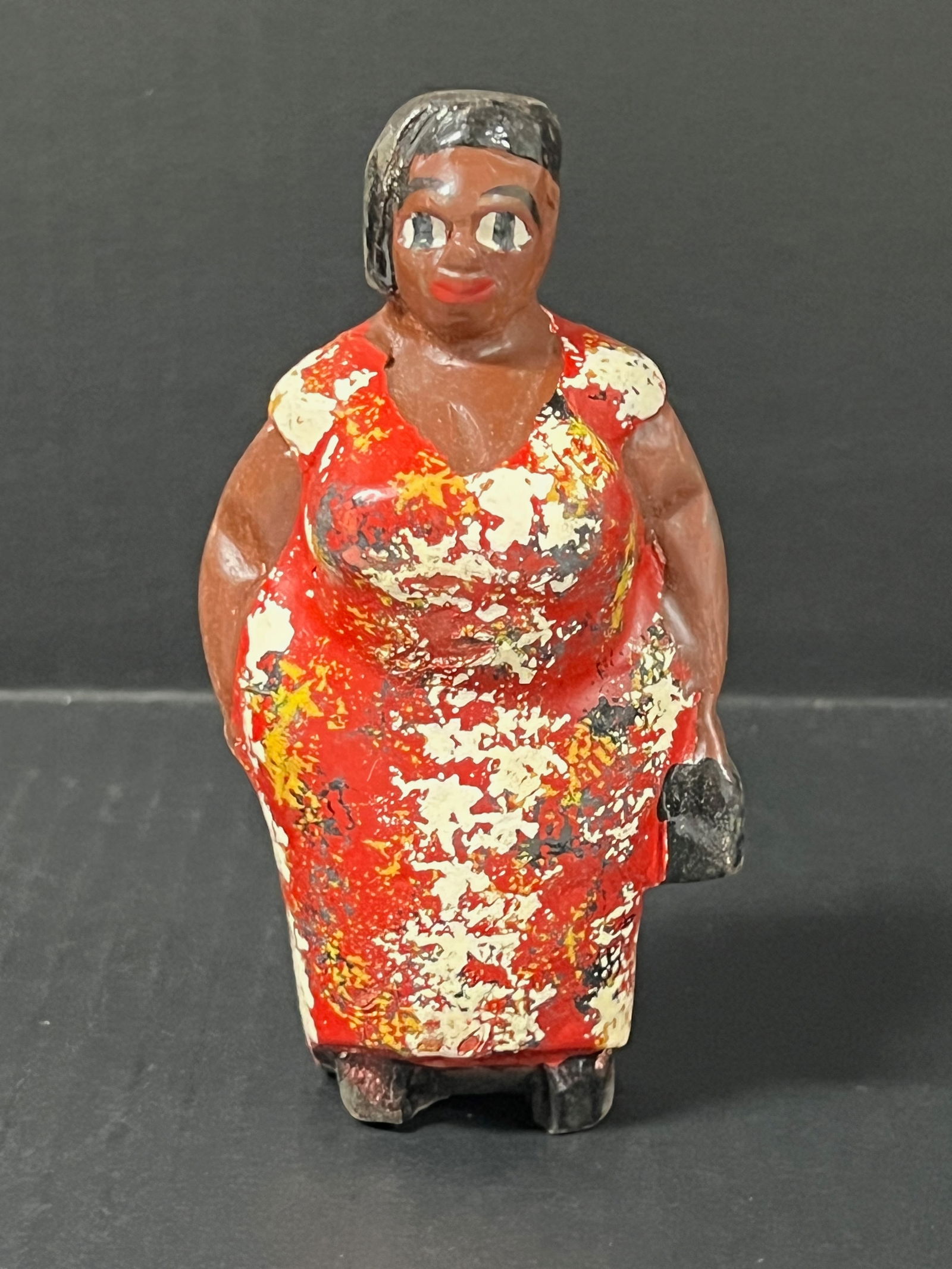 Colonial Statue: African Tribal Art Colonial Statue. The dimension is 5.5 inches high x 2.75 inches wide. Please be aware that some of the items are vintage, secondhand, old ages, antiques and may have a defects or si