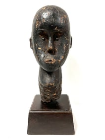 Fang Head Statue