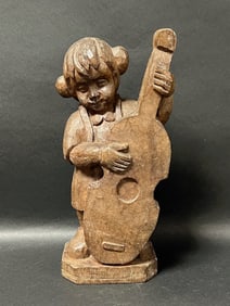 Carved Wood Boy Playing Cello
