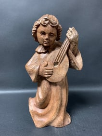 Carved Wood Girl Playing Guitar