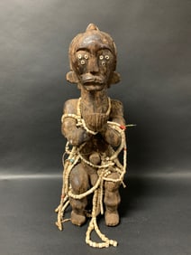 Fang Fetish Statue