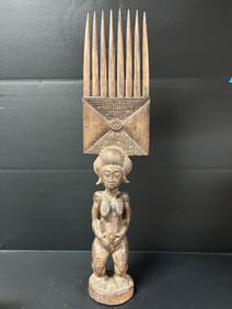 Baule Statue and Comb