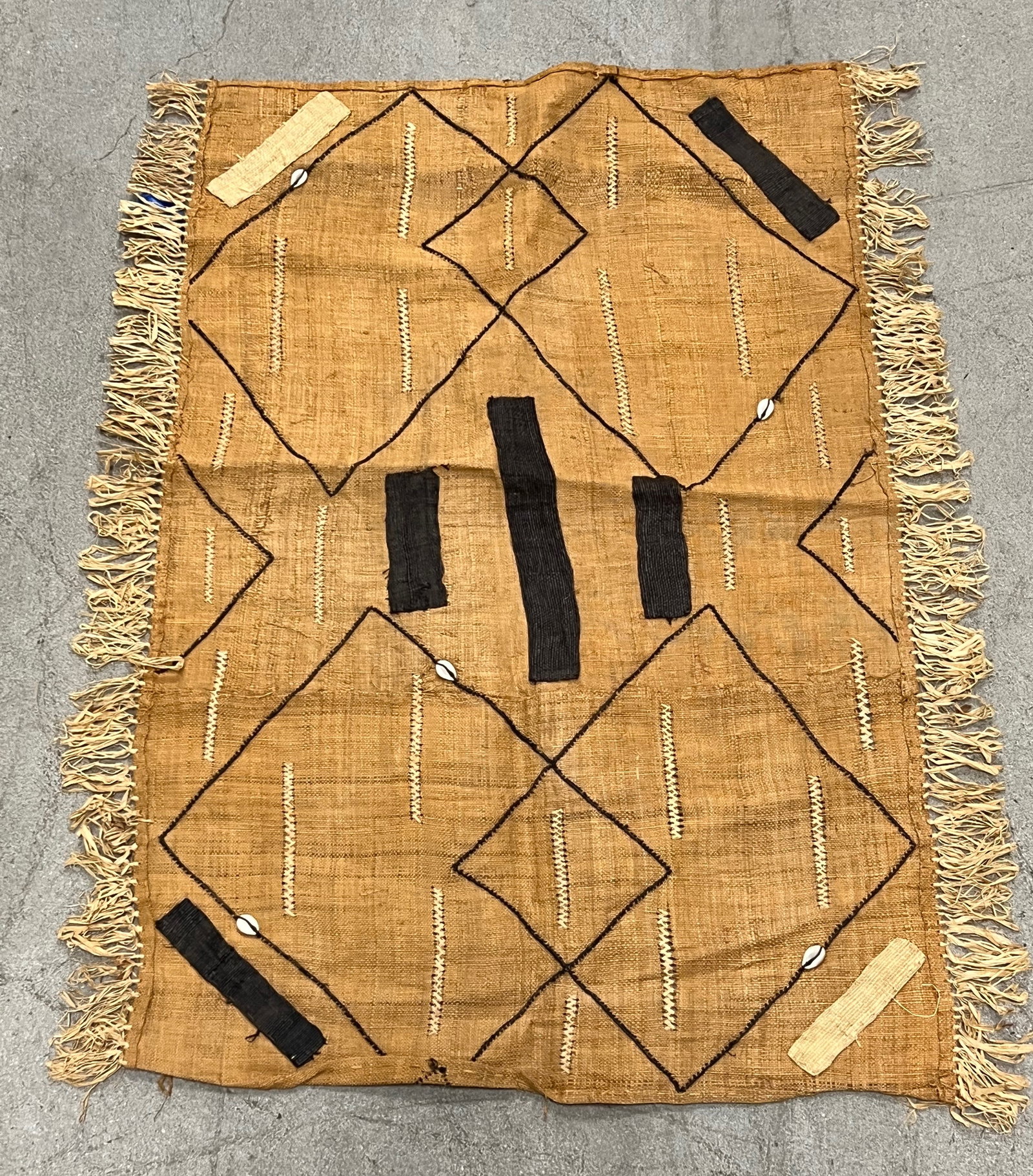 Kuba Cloth: African Tribal Art Kuba Cloth. The dimension is 33 inches long x 21 inches wide. Please be aware that some of the items are vintage, secondhand, old ages, antiques and may have a defects or sign of ag