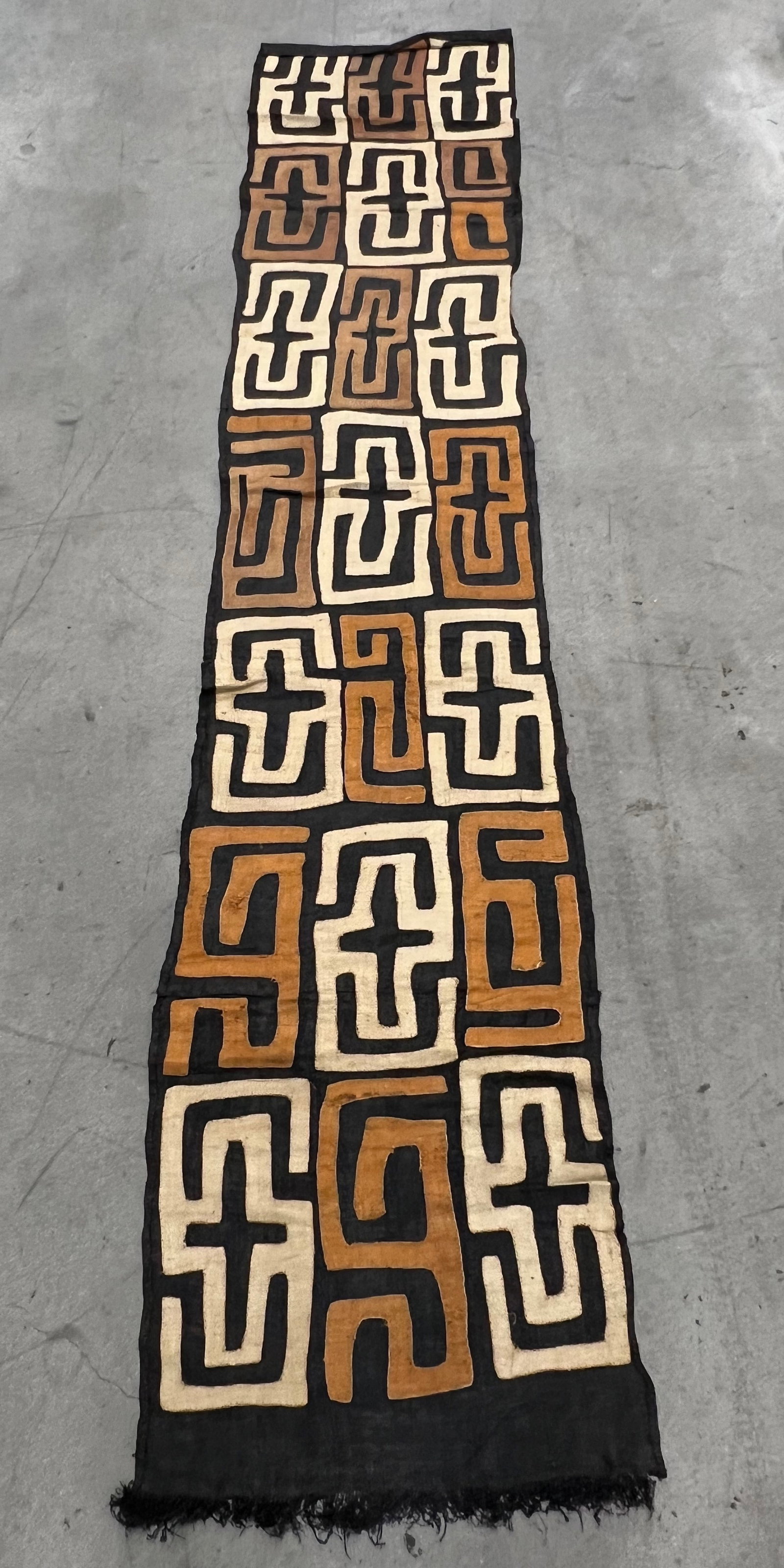 Kuba Cloth: African Tribal Art Kuba Cloth. The dimension is 108 inches long x 21 inches wide. Please be aware that some of the items are vintage, secondhand, old ages, antiques and may have a defects or sign of a