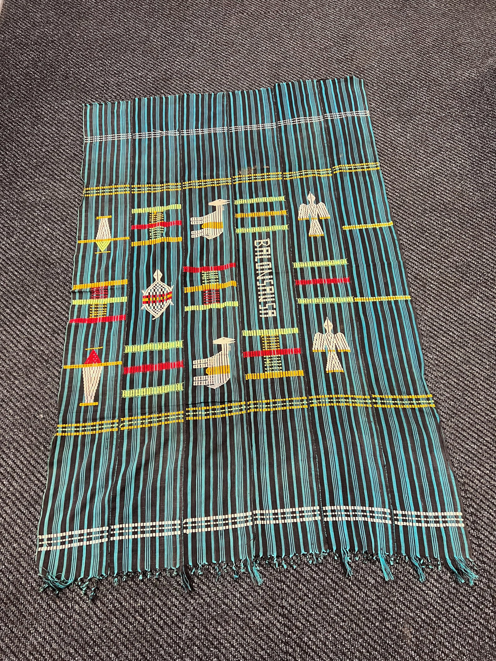 100% Cotton Baule Ikat Cloth: African Tribal Art 100% Cotton Baule Ikat Cloth. The dimension is 68 inches high x 44 inches wide. Please be aware that some of the items are vintage, secondhand, old ages, antiques and may have a def