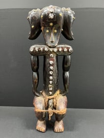 Fang Statue