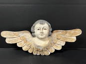 Cherub with Long Wings and Glass Eyes