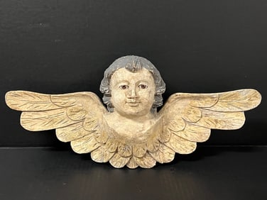 Cherub with Long Wings and Glass Eyes