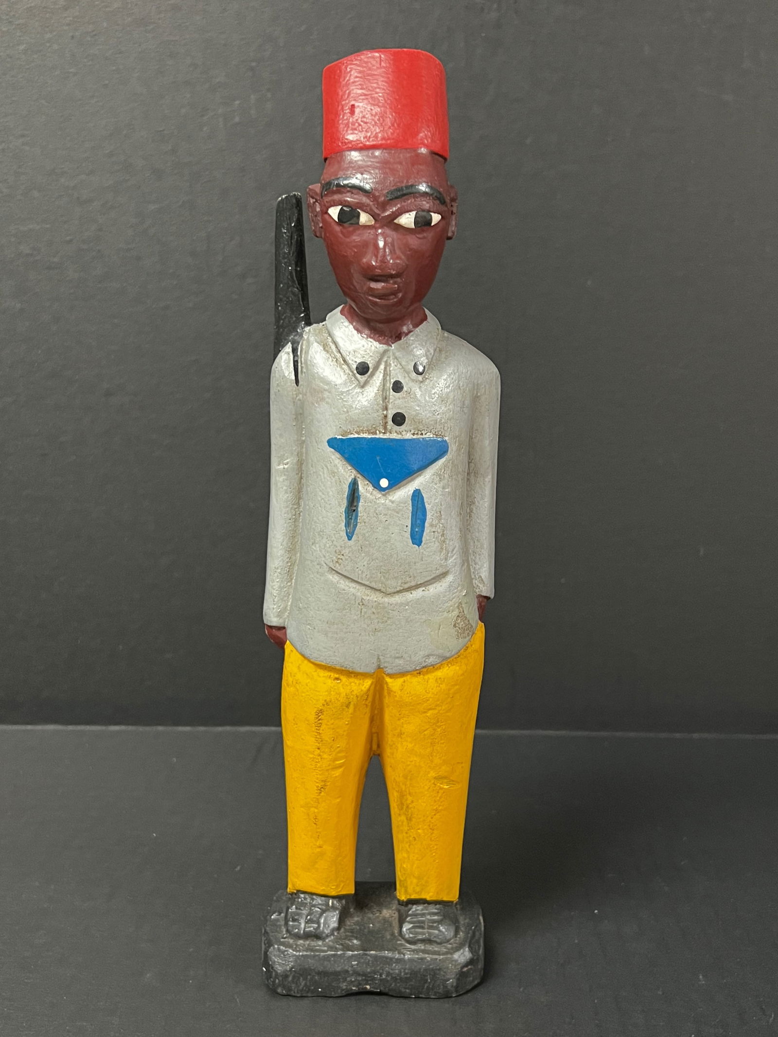 Colonial Statue: African Art Colonial Statue. The dimension 12 inches high x 3 inches wide. Please be aware that some of the items are vintage, secondhand, old ages, antiques and may have a defects or sign of ages, Ho