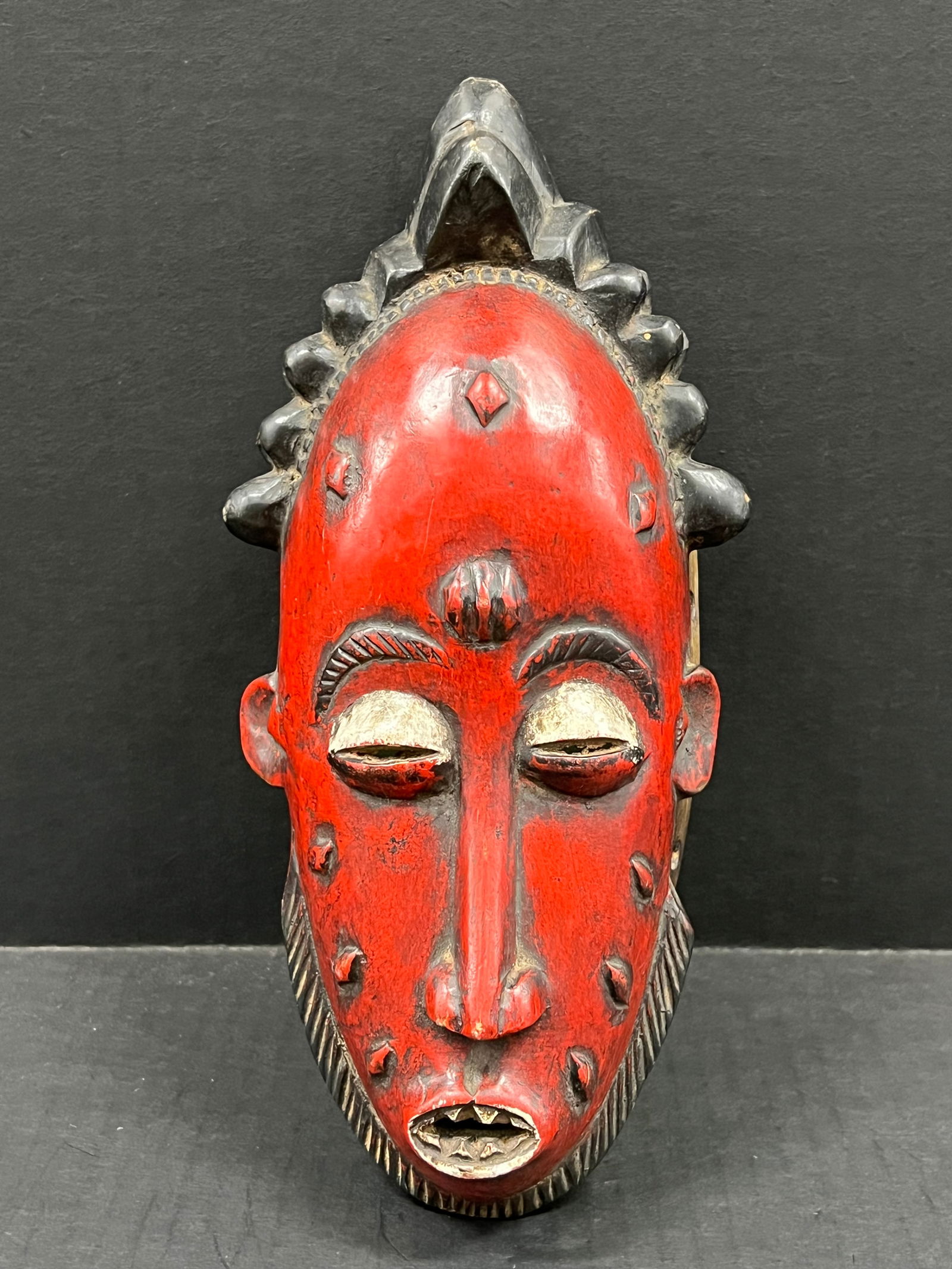 Baule Mask: African Tribal Art Carved Wood Kwele Mask. The dimension is 11 inches high x 5 inches wide. Please be aware that some of the items are vintage, secondhand, old ages, antiques and may have a defects