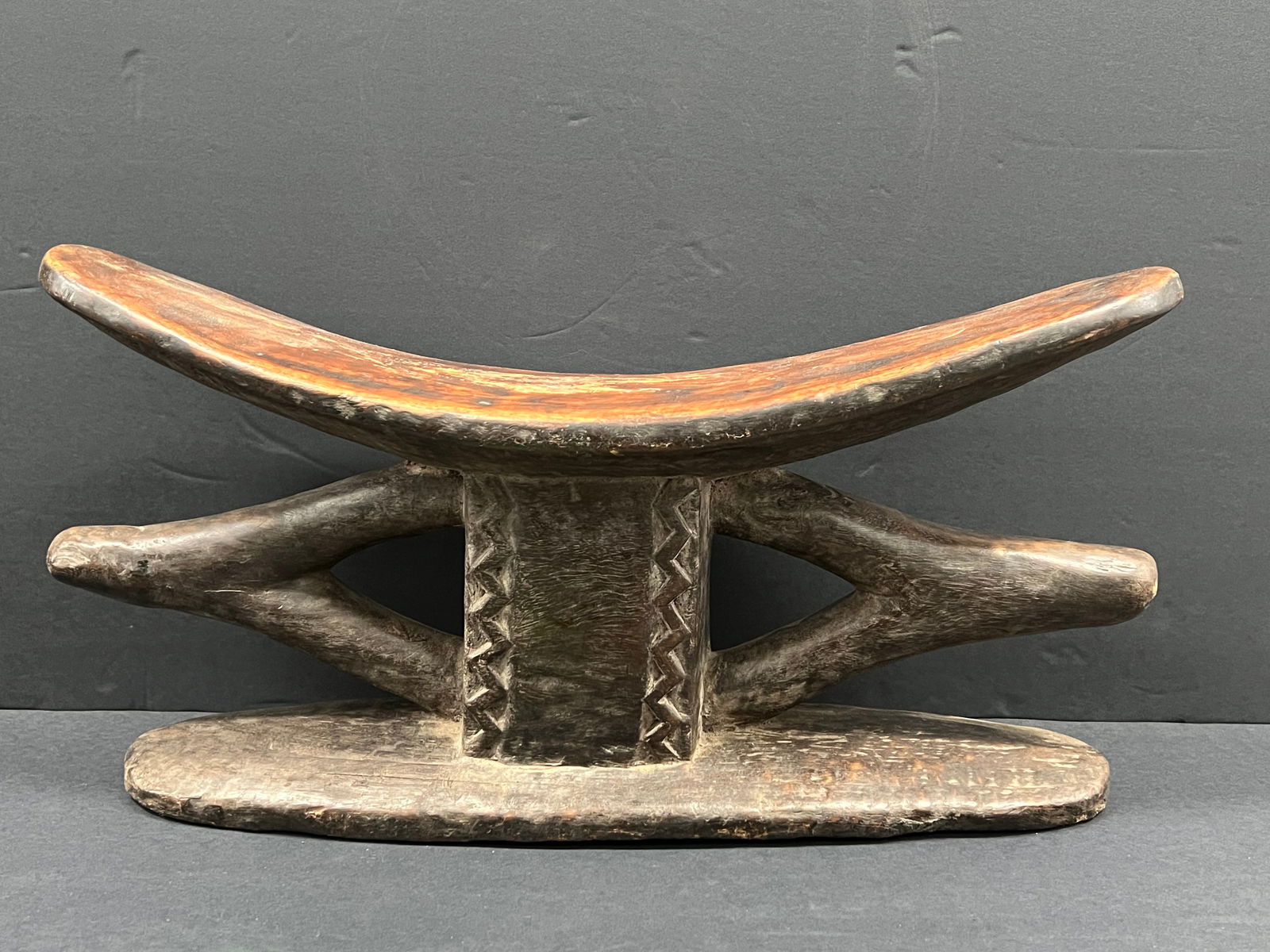 Ashanti Stool: African Tribal Art Carved Wood Ashanti Stool. The dimension is 11 inches high x 22 inches wide. Please be aware that some of the items are vintage, secondhand, old ages, antiques and may have a