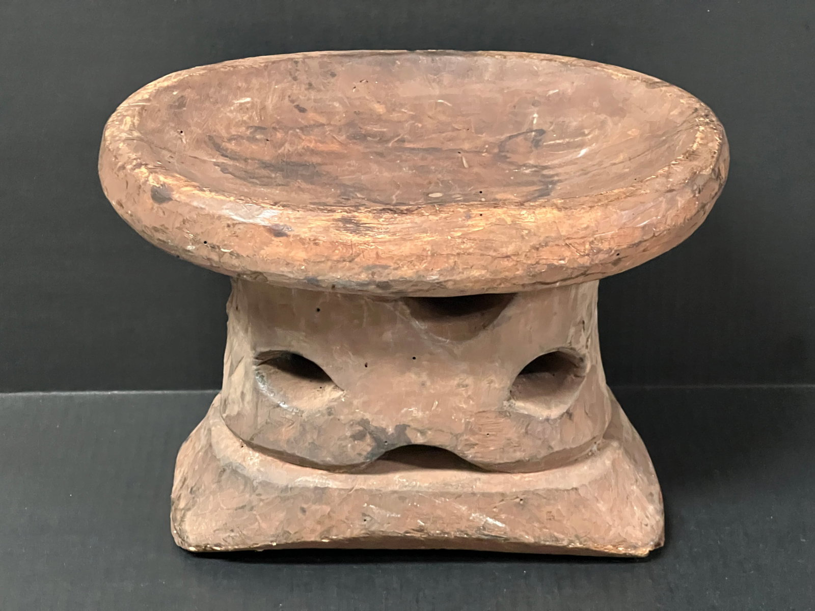 Bamileke Stool: African Tribal Art Carved Wood Bamileke Stool. The dimension is 9 inches high x 12.5 inches wide. Please be aware that some of the items are vintage, secondhand, old ages, antiques and may have a