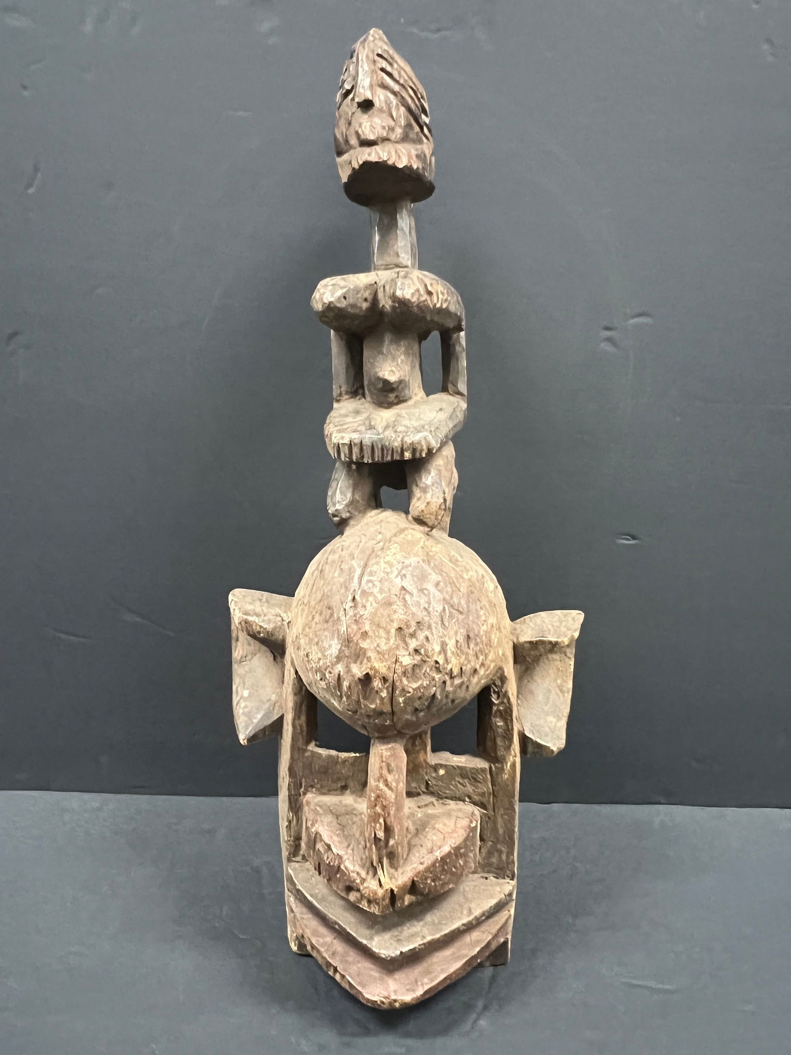 Dogon Mask: African Tribal Art Carved Wood Dogon Mask. The dimension is 21.5 inches high x 9 inches wide. Please be aware that some of the items are vintage, secondhand, old ages, antiques and may have a defects