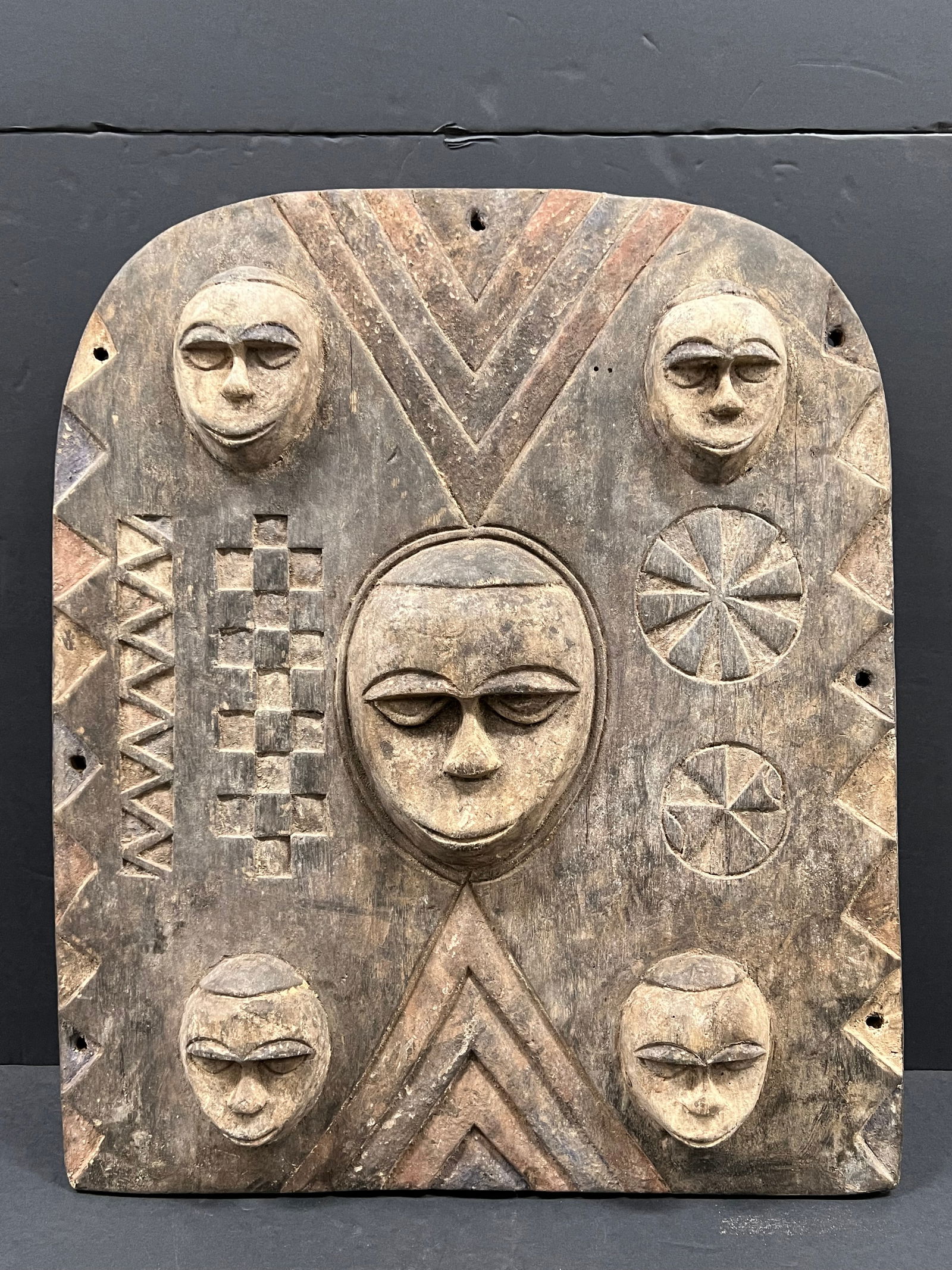 Yuroba Door: African Tribal Art Carved Wood Yuroba Door. The dimension is 23 inches high x 19.5 inches wide. Please be aware that some of the items are vintage, secondhand, old ages, antiques and may have a