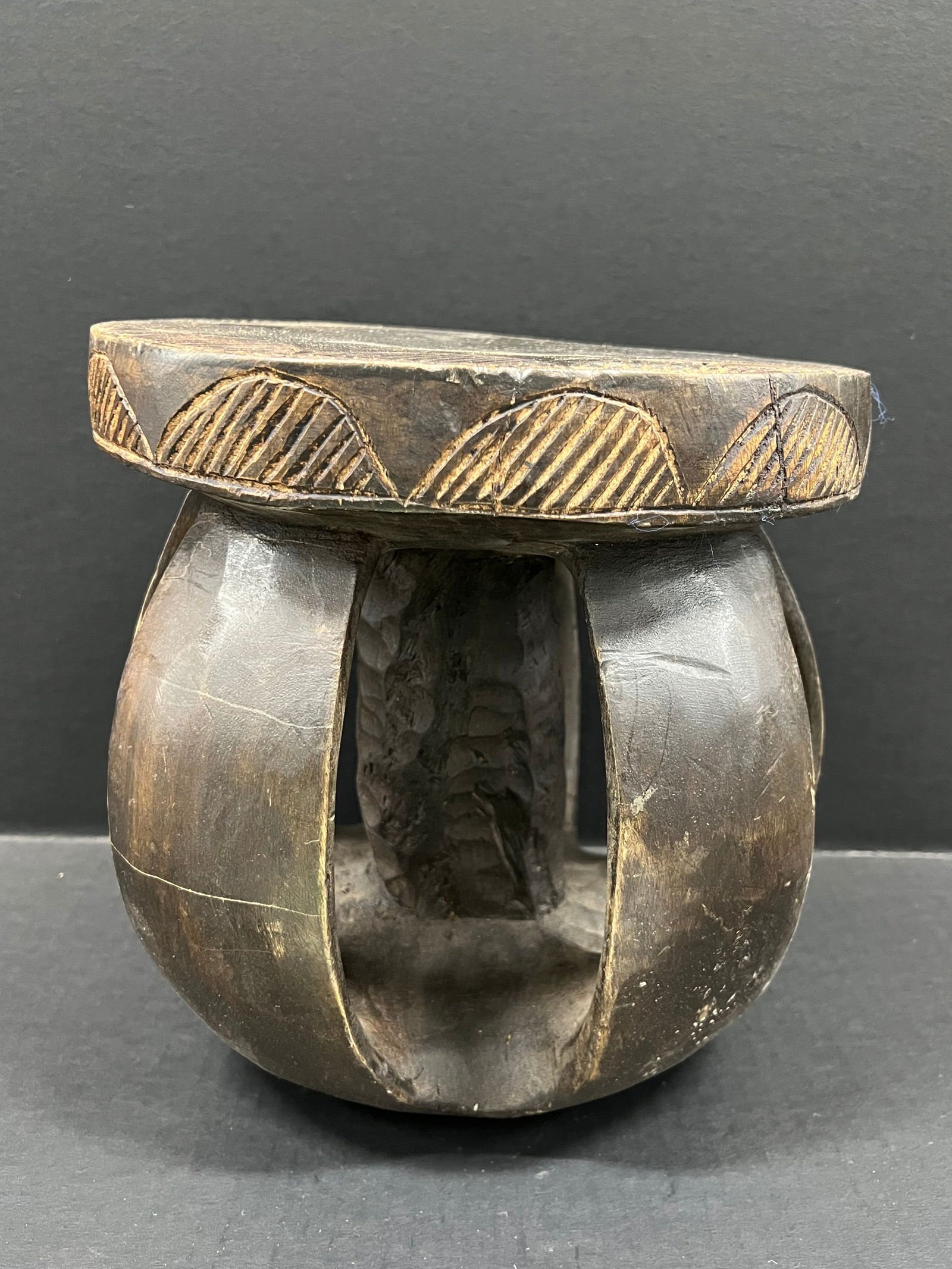 Baga Stool: African Tribal Art Carved Wood Baga Stool. The dimension is 10.5 inches high x 10 inches wide. Please be aware that some of the items are vintage, secondhand, old ages, antiques and may have a defects