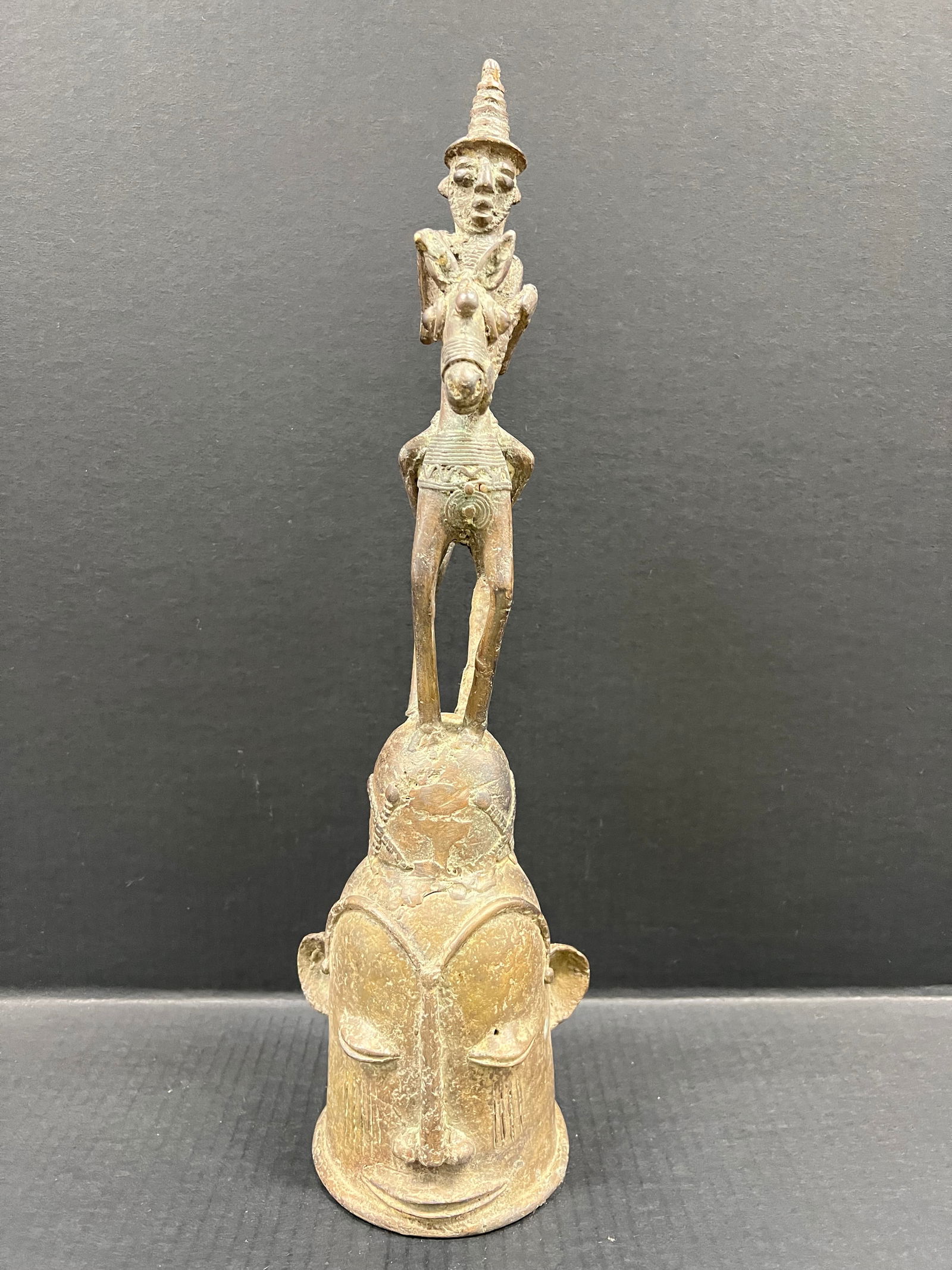 Chad Bronze Bell: African Tribal Art Chad Bronze Bell. The dimension is 19.5 inches high x 6 inches depth x 5.5 inches wide. Please be aware that some of the items are vintage, secondhand, old ages, antiques and may