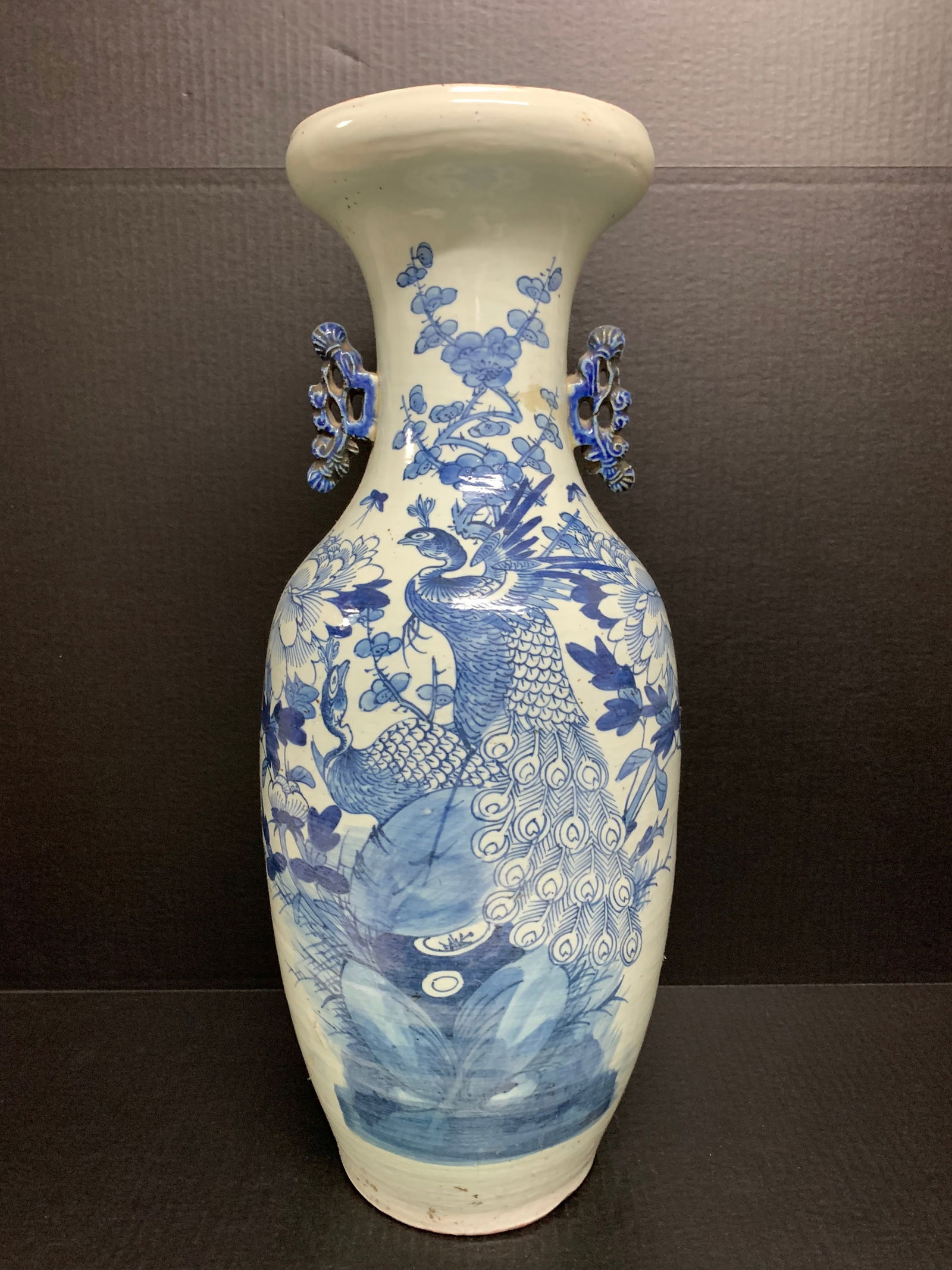 Porcelain Blue and White Vase: Chinese Art Porcelain Blue and White Vase. The dimension is 24 inches high x 20 inches wide. Please be aware that some of the items are vintage, secondhand, old ages, antiques and may have a defects