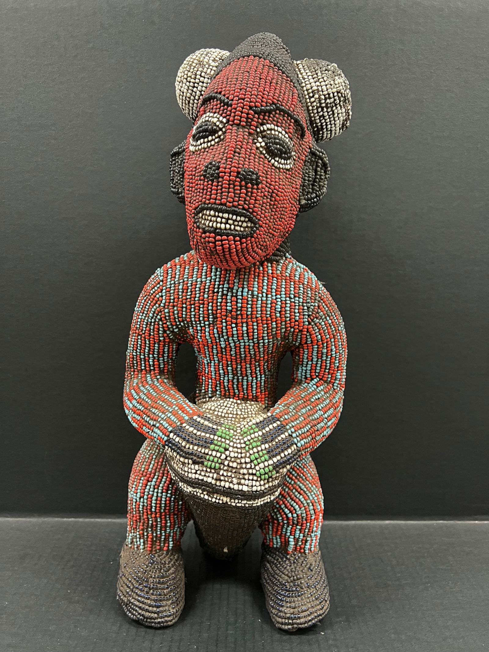 Large Bamileke Beaded Statue: African Tribal Art Large Bamileke Beaded Statue. The dimension is 21 inches high x 8.5 inches depth x 8.5 inches wide. Please be aware that some of the items are vintage, secondhand, old ages, antique