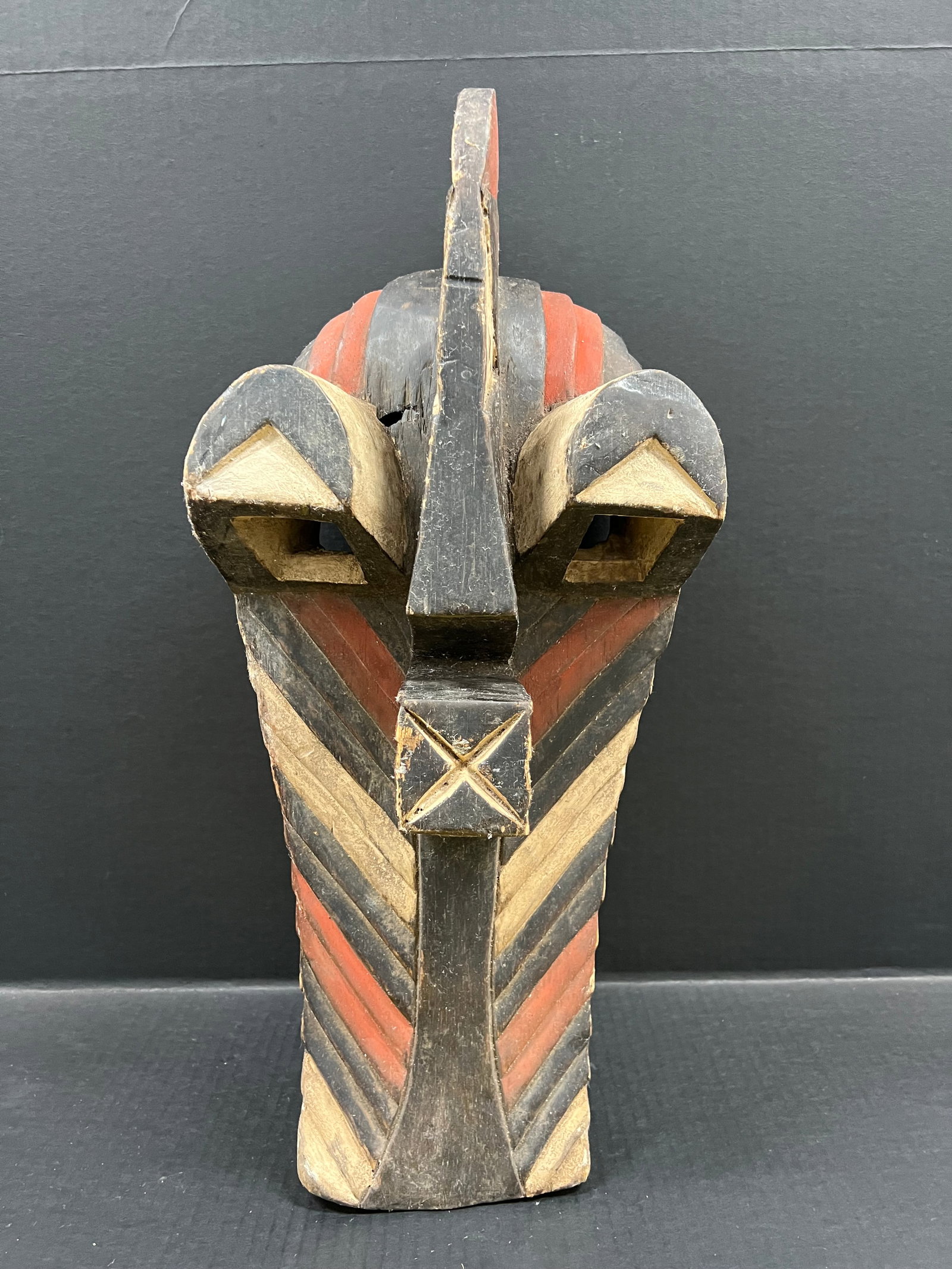 Songye Mask: African Tribal Art Carved Wood Songye Mask. The dimension is 22 inches high x 10 inches wide. Please be aware that some of the items are vintage, secondhand, old ages, antiques and may have a defects