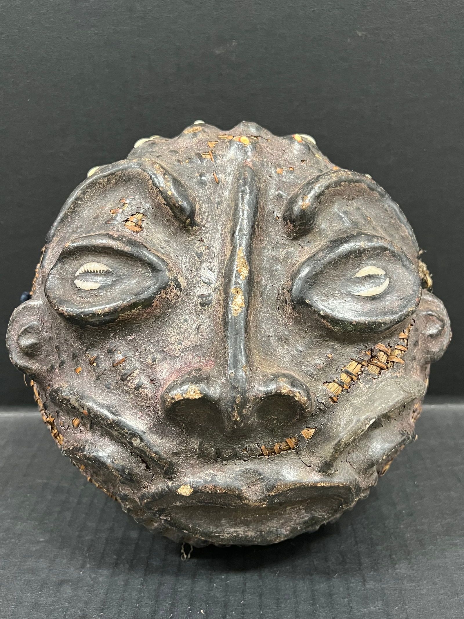 Bamileke Headdress: African Tribal Art Carved Wood Bamileke Headdress. The dimension is 9 inches high x 4 inches wide. Please be aware that some of the items are vintage, secondhand, old ages, antiques and may have a