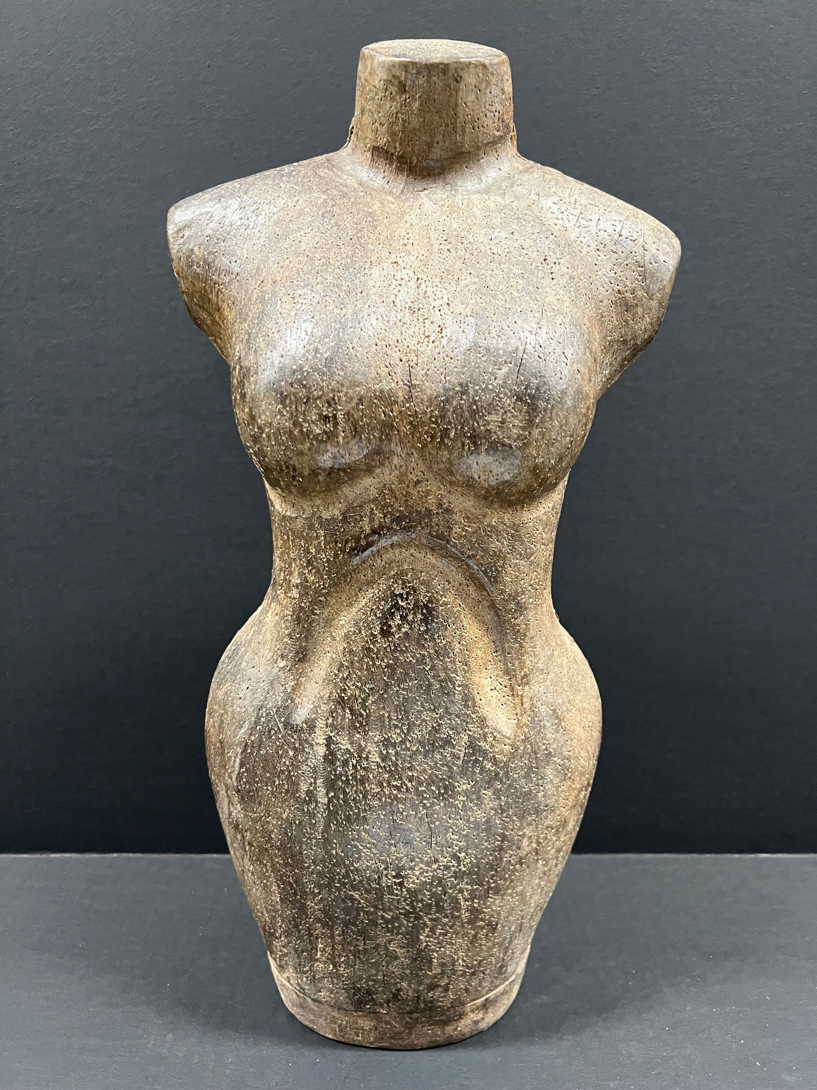 Carved Wood Mannequin - Torso: Folk Art Carved Wood Mannequin. The dimension is 18 inches high x 8.5 inches wide. Please be aware that some of the items are vintage, secondhand, old ages, antiques and may have a defects or sign of