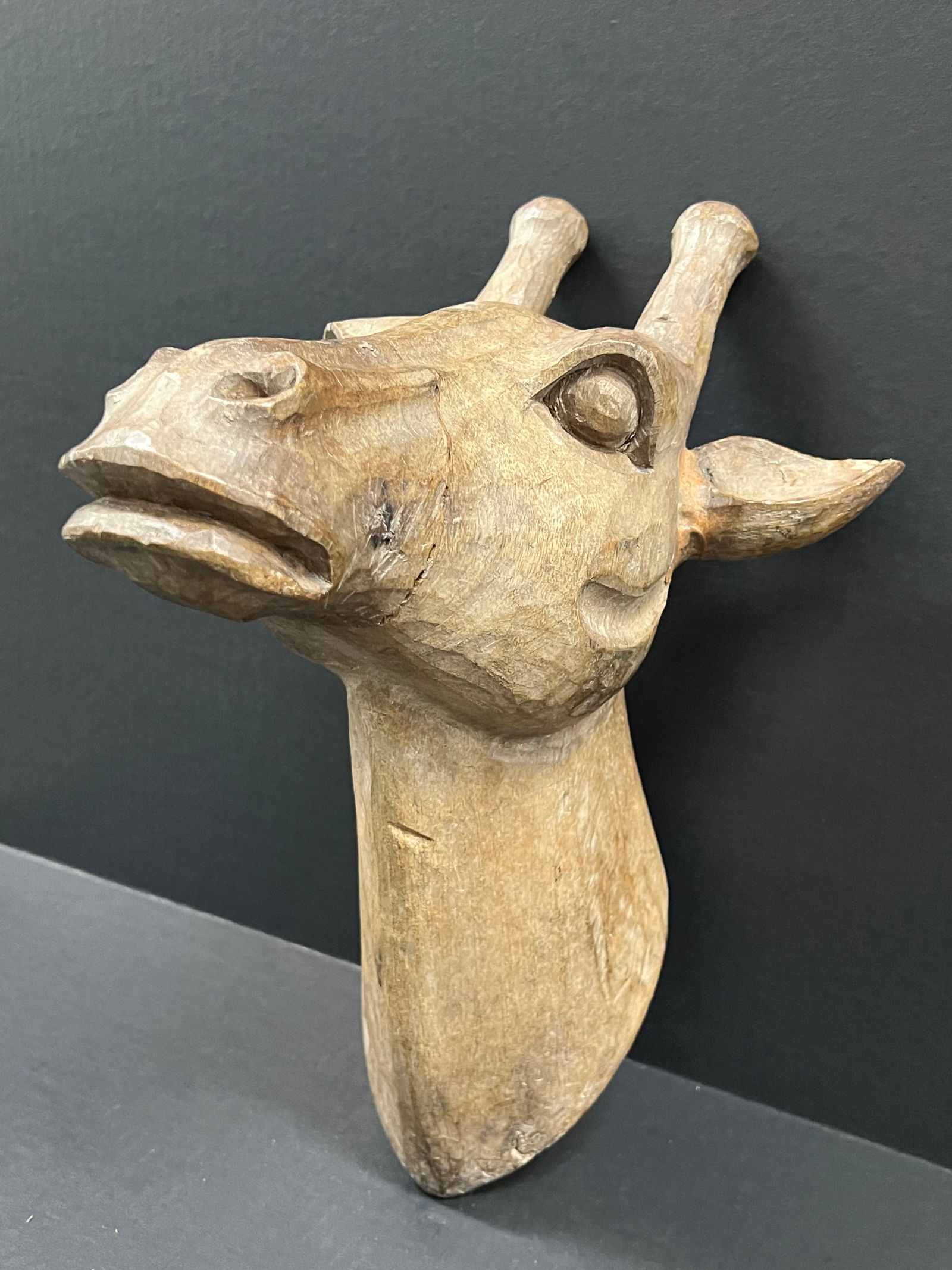 Carved Wood Large Deer Head: Folk Art Carved Wood Papermache Mold of Large Deer Head. The dimension is 15.5 inches high x 11 inches depth x 9.5 inches wide. Please be aware that some of the items are vintage, secondhand, old ages