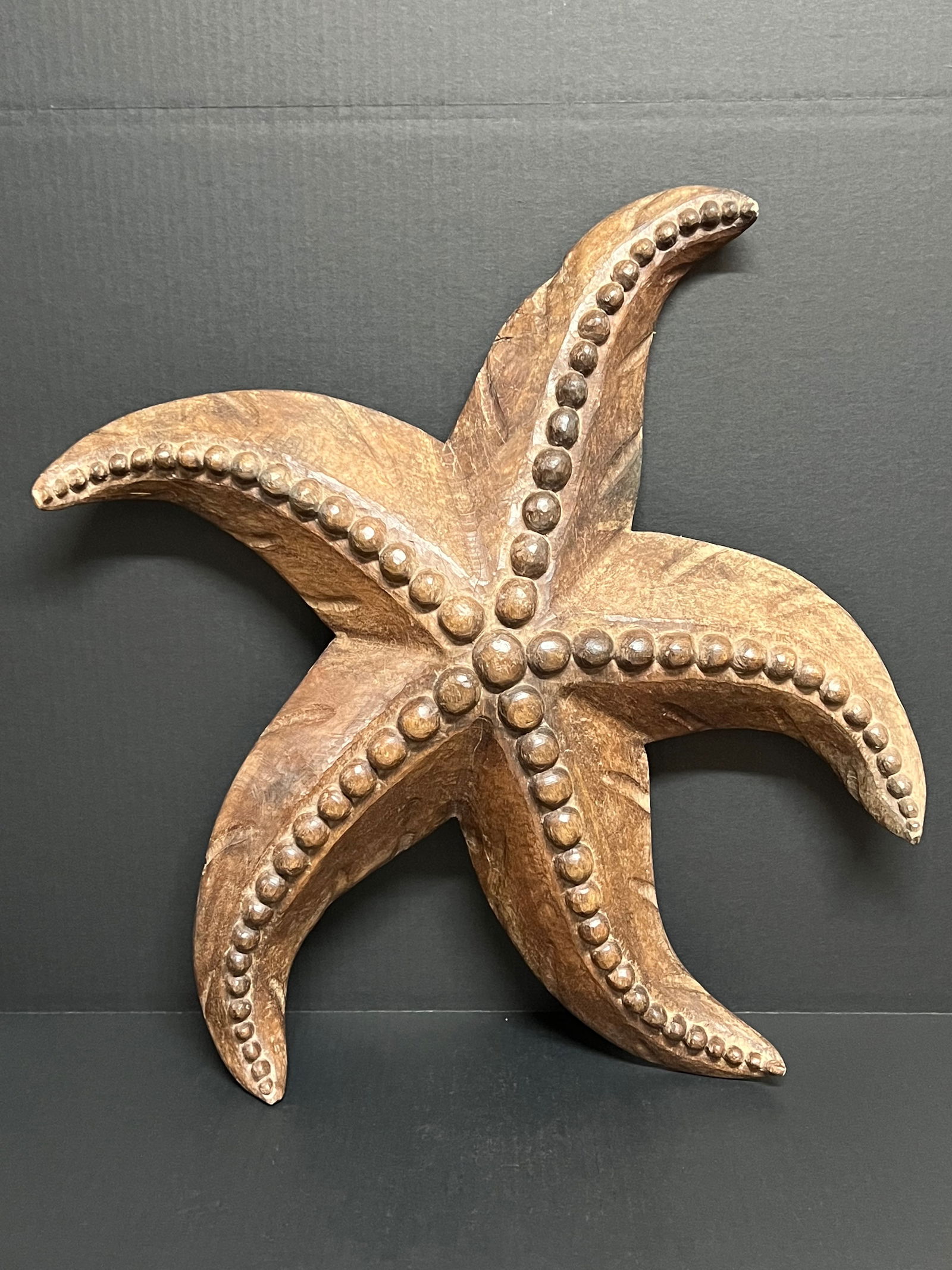 Large Carved Wood Starfish Sculpture: Folk Art Large Carved Wood Starfish Sculpture. The dimension is 26 inches high x 24 inches wide. Please be aware that some of the items are vintage, secondhand, old ages, antiques and may have a defec