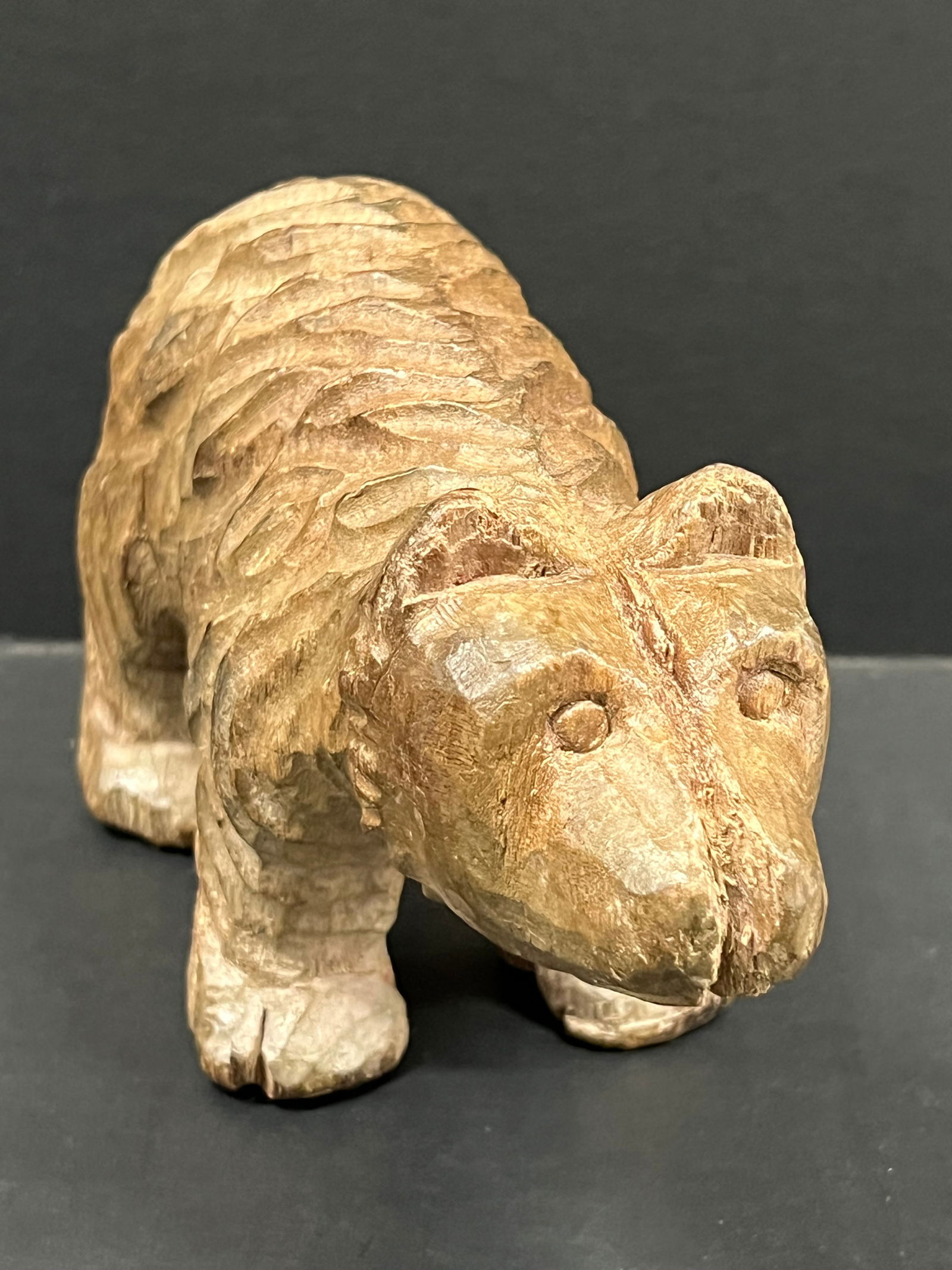 Carved Wood Bear Sculpture: Folk Art Carved Wood Papermache Mold of Bear Sculpture. The dimension is 4.5 inches high x 8 inches wide. Please be aware that some of the items are vintage, secondhand, old ages, antiques and may