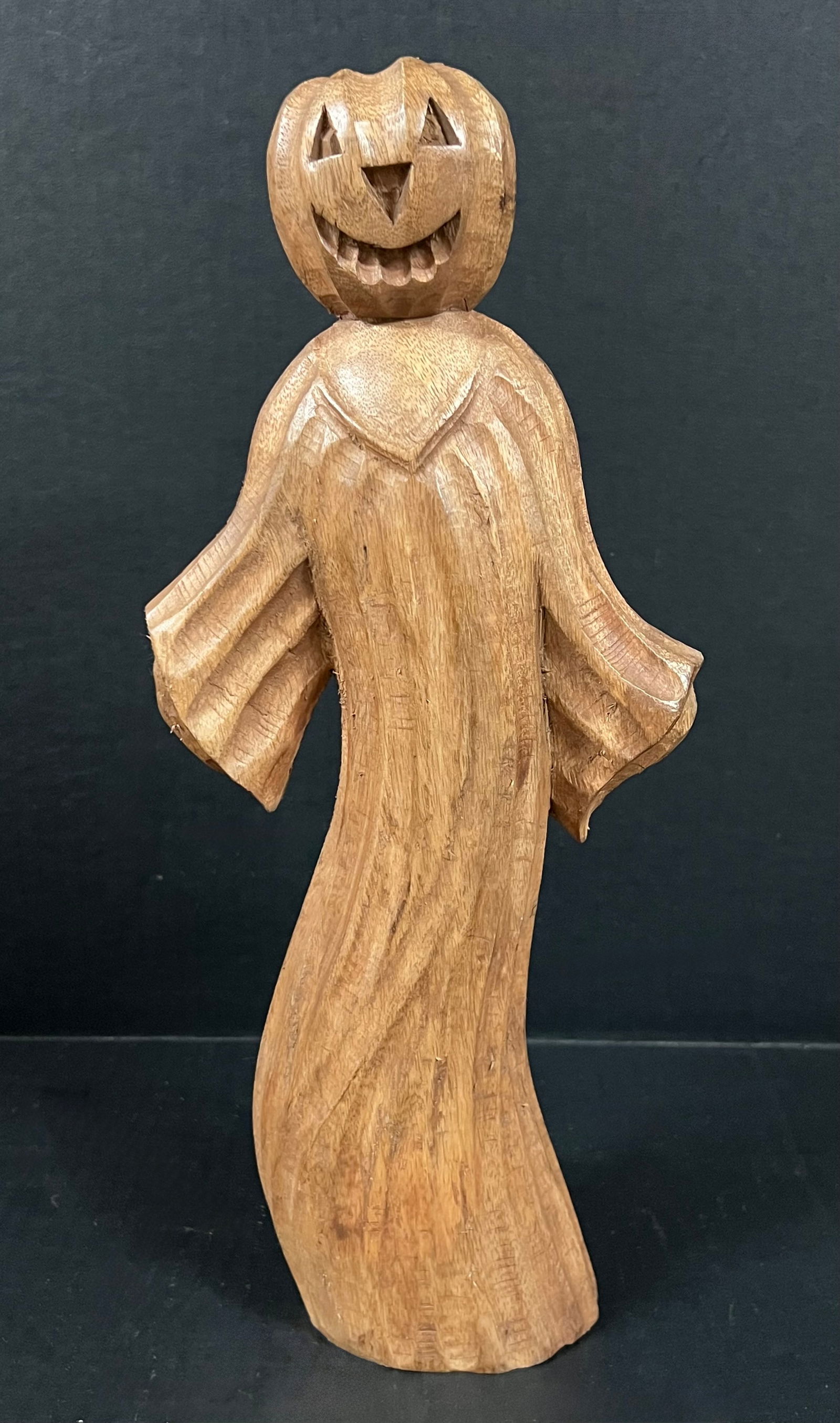 Carved Wood Ghost with Jack O Lantern Pumpkin Head Sculpture: Folk Art Carved Wood Papermache Mold of Jack O Lantern Pumpkin Head Sculpture. The dimension is 14.5 inches high x 6 inches wide. Please be aware that some of the items are vintage, secondhand, old