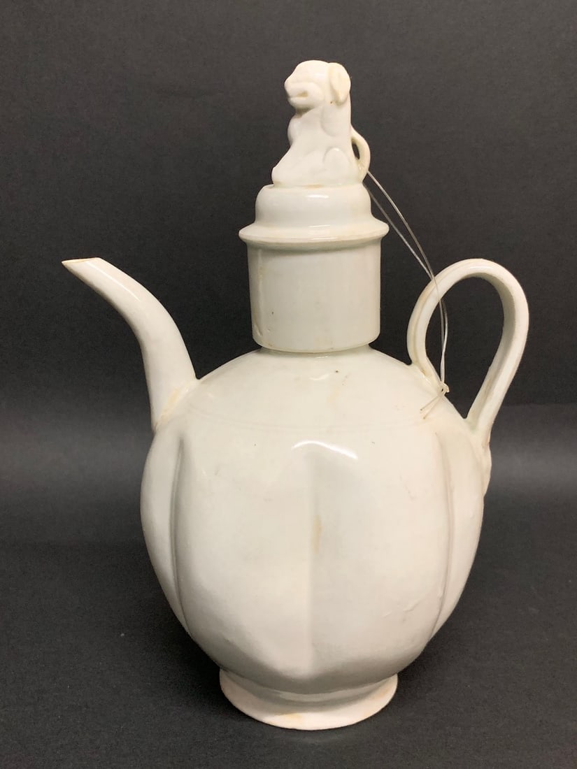 Porcelain Celadon Qingbai Tea Pot: Chinese Art Porcelain Celadon Qingbai Tea Pot. The dimension is 8.5 inches high x 6 inches wide. Please be aware that some of the items are vintage, secondhand, old ages, antiques and may have a