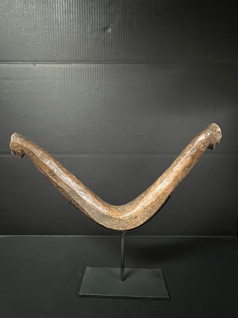 Philippine Tribal Art Carved Wood Carabao Yoke with Display Stand: Philippine Tribal Art Carved Wood Carabao Yoke with Display Stand. The dimension is 16 inches high x 17 inches wide. Please be aware that some of the items are vintage, secondhand, old ages, antiques