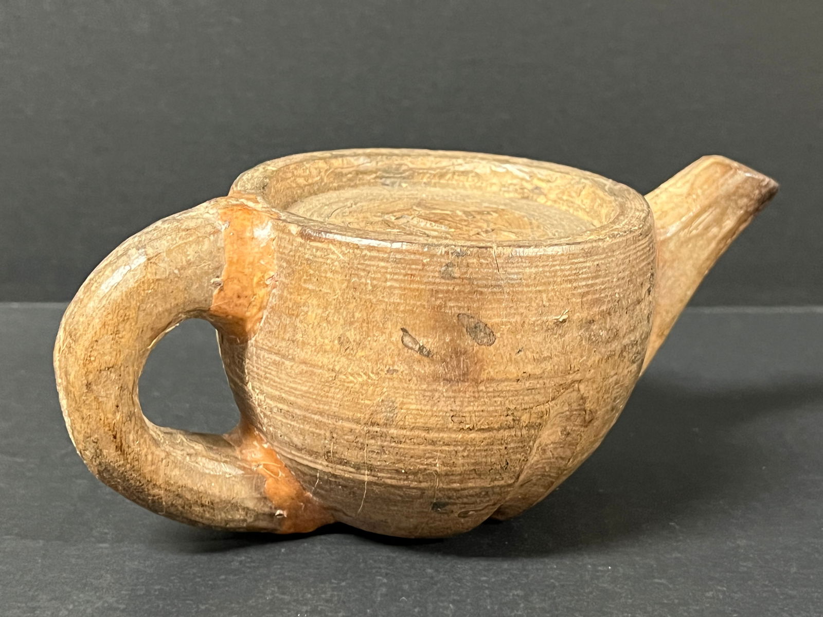 Carved Wood Teapot: Folk Art Carved Wood Papermache Mold of Teapot. The dimension is 3.5 inches high x 4.5 inches depth x 8 inches wide. Please be aware that some of the items are vintage, secondhand, old ages, antiques