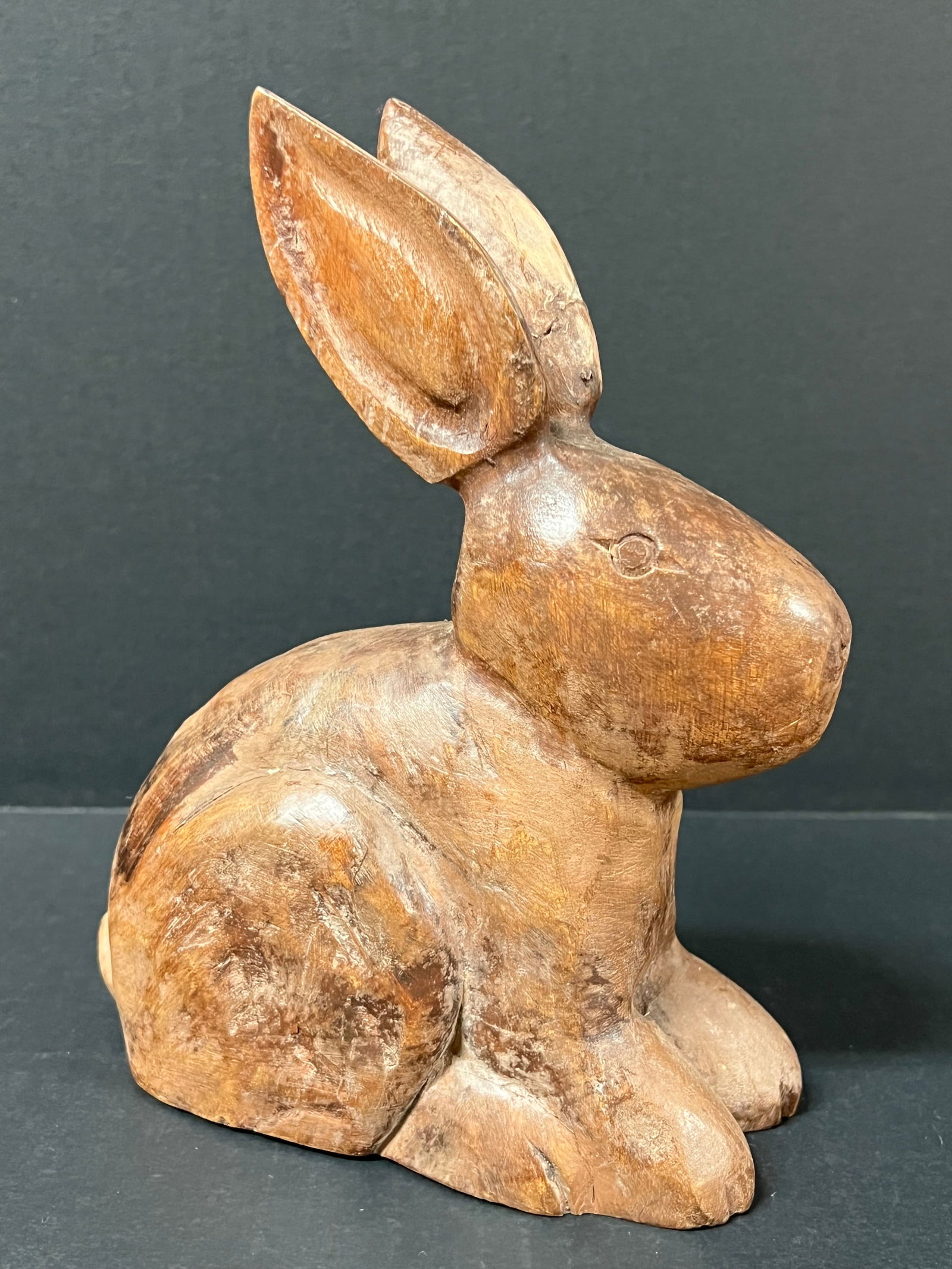 Carved Wood Rabbit: Folk Art Carved Wood Papermache Mold of Rabbit. The dimension is 8 inches high x 6.5 inches depth x 3 inches wide. Please be aware that some of the items are vintage, secondhand, old ages, antiques