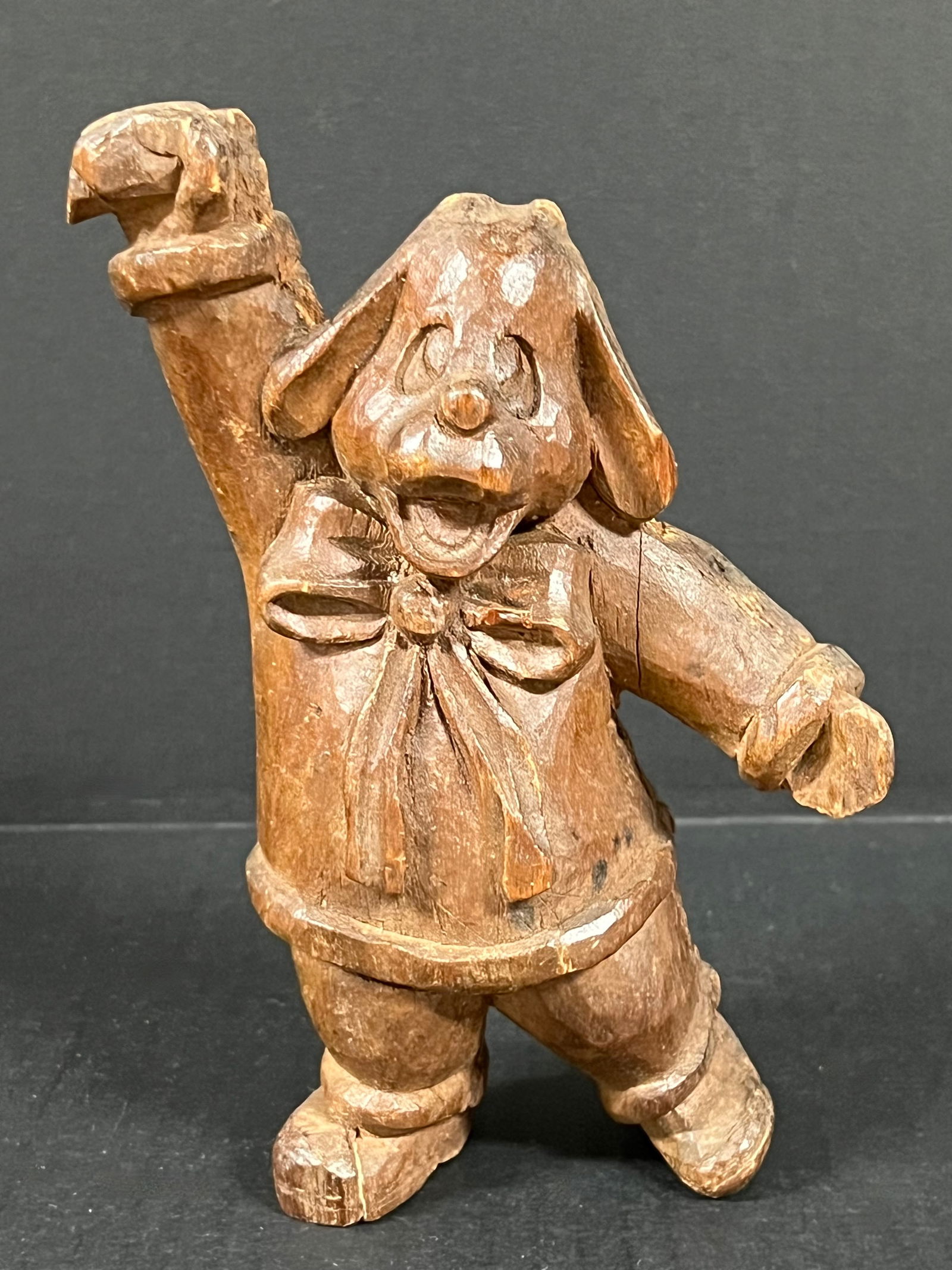 Carved Wood Dog: Folk Art Carved Wood Papermache Mold of Dog. The dimension is 7.75 inches high x 5.5 inches wide. Please be aware that some of the items are vintage, secondhand, old ages, antiques and may have a