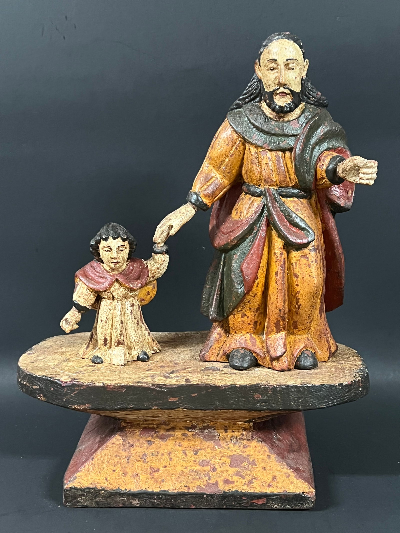 Carved Wood Saint Joseph and Baby Jesus: Religious Art Carved Wood Saint Joseph and Baby Jesus. The dimension is 13.5 inches high x 10.5 inches wide. Please be aware that some of the items are vintage, secondhand, old ages, antiques and may