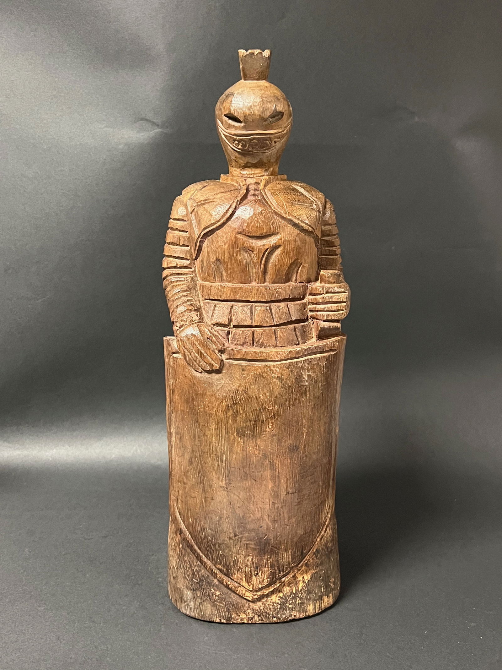 Carved Wood Warrior Sculpture: Folk Art Carved Wood Warrior Sculpture. The dimension is 17 inches high x 6 inches wide. Please be aware that some of the items are vintage, secondhand, old ages, antiques and may have a defects or