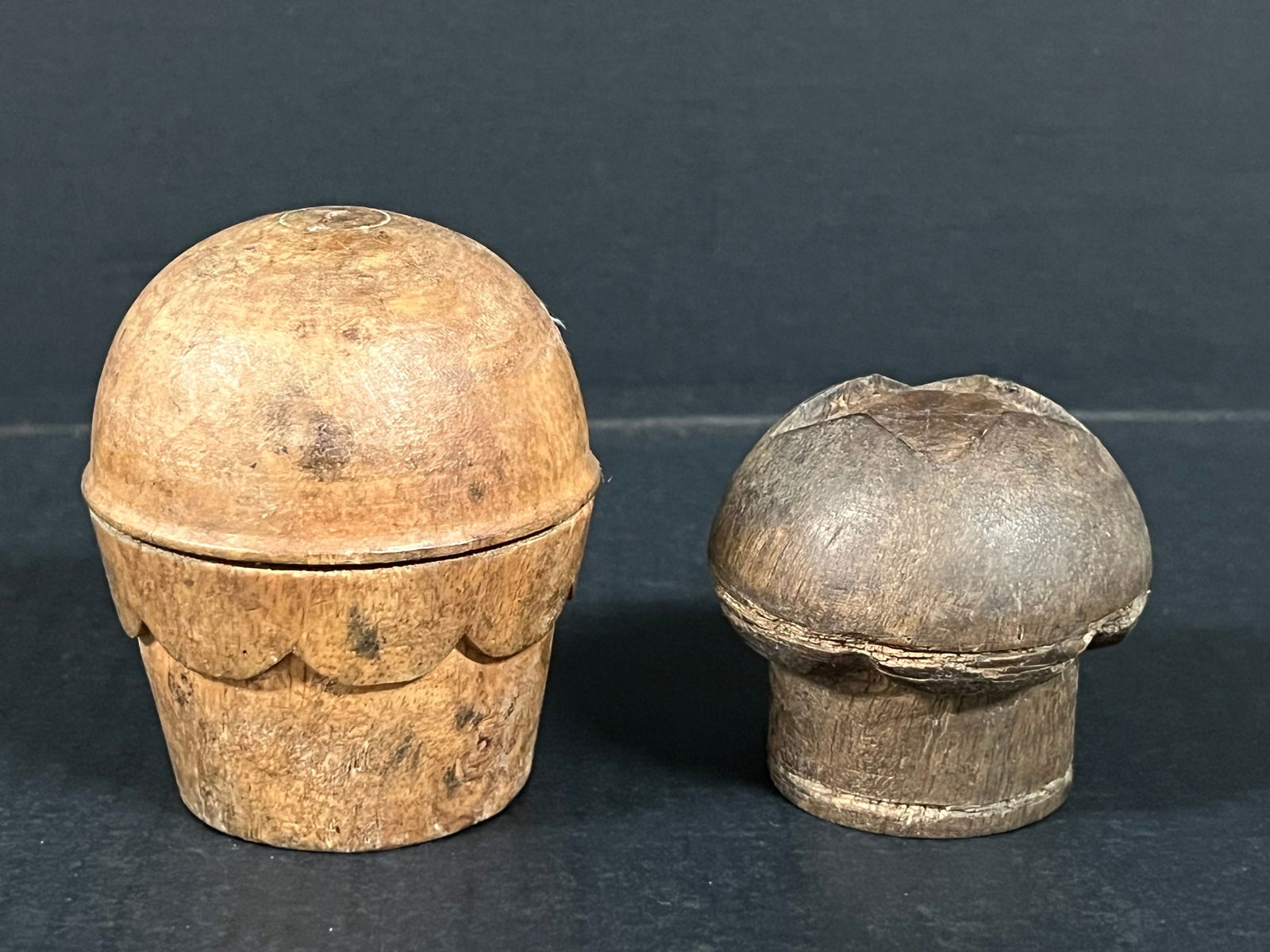 Carved Wood Cupcake set of 2: Folk Art Carved Wood Papermache Mold of Cupcake . The dimension is 2.5 inches high x 2.75 inches wide and 3.5 inches high x 3 inches wide. Please be aware that some of the items are vintage,