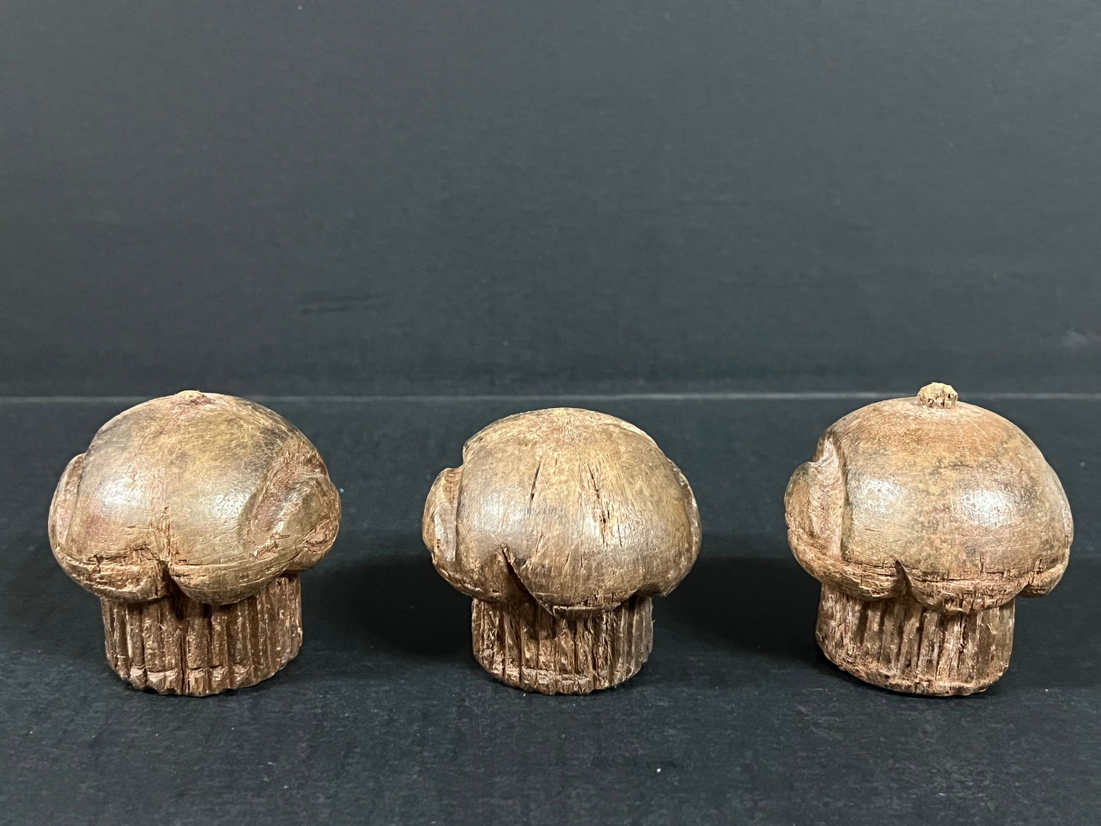 Carved Wood Cupcake set of 3: Folk Art Carved Wood Papermache Mold of Cupcake. The dimension is 2.75 inches high x 2.75 inches wide. Please be aware that some of the items are vintage, secondhand, old ages, antiques and may have