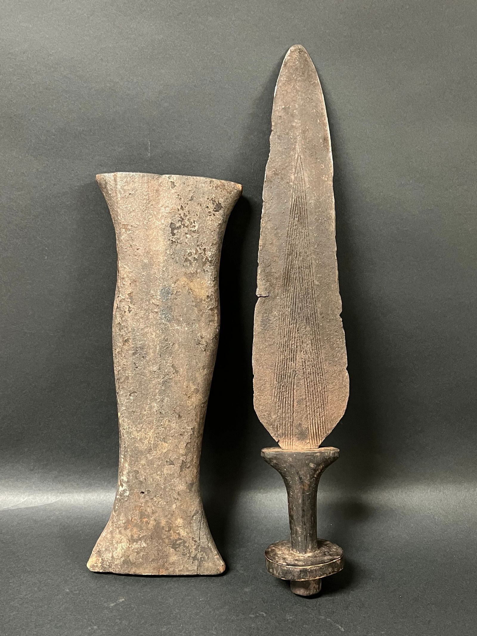 Baule Weapon: African Tribal Art Baule Weapon. The dimension is 17 inches high x 4.75 inches wide. Please be aware that some of the items are vintage, secondhand, old ages, antiques and may have a defects or sign