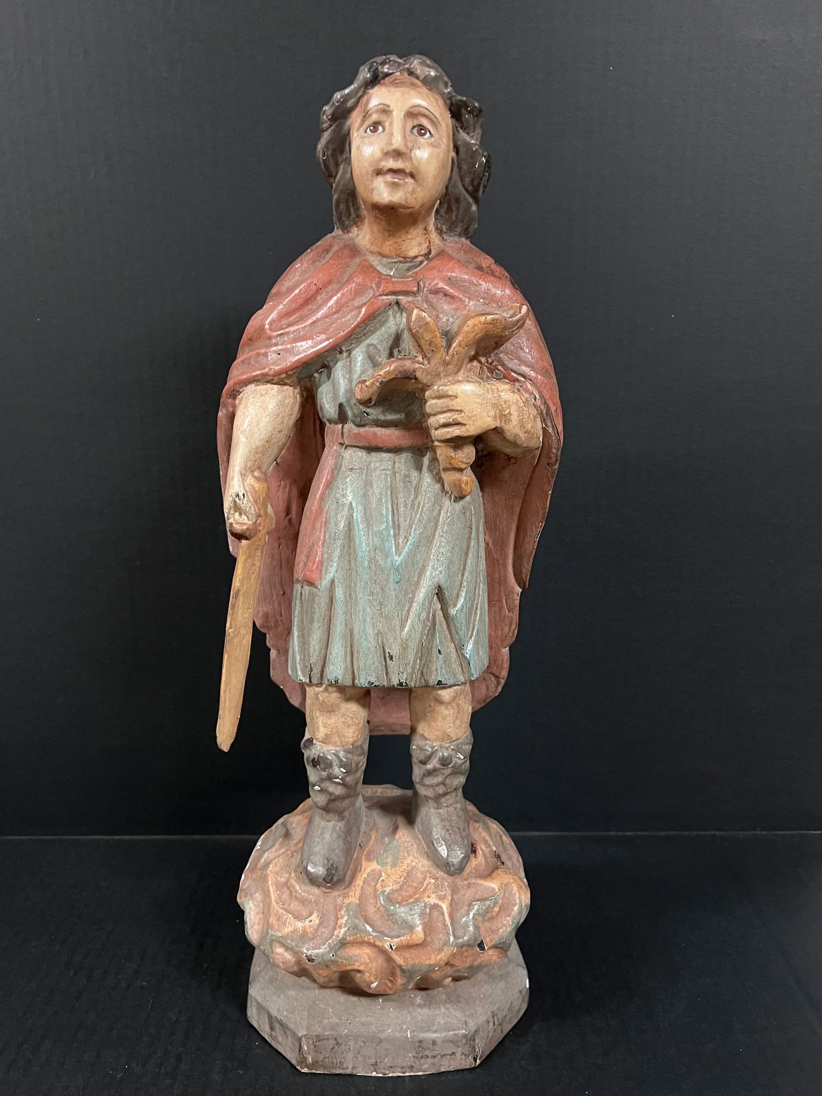 Carved Wood Archangel: Religious Art Carved Wood Archangel. The dimension is 18.5 inches high x 5 inches depth x 6 inches wide. Please be aware that some of the items are vintage, secondhand, old ages, antiques and may