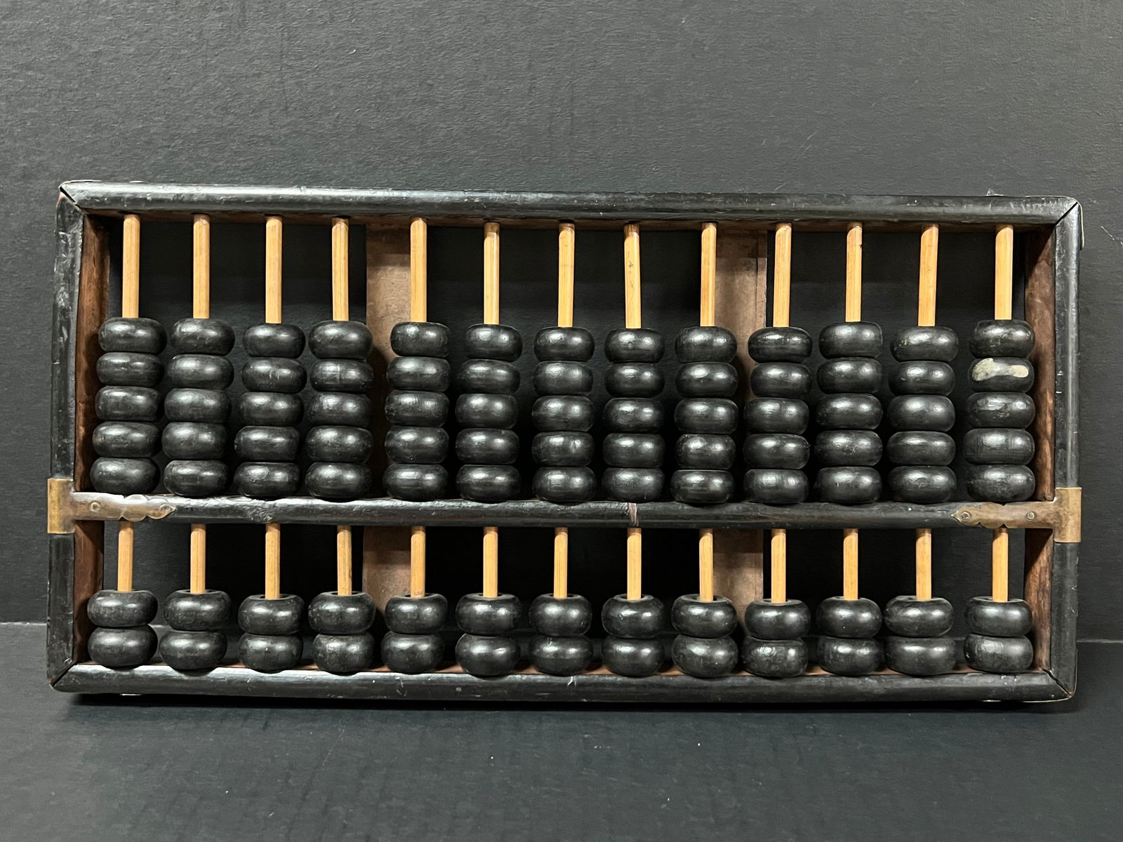 Carved Wooden Abacus: Chinese Art Carved Wooden Abacus. The dimension is 8 inches high x 14 inches wide. Please be aware that some of the items are vintage, secondhand, old ages, antiques and may have a defects or sign of