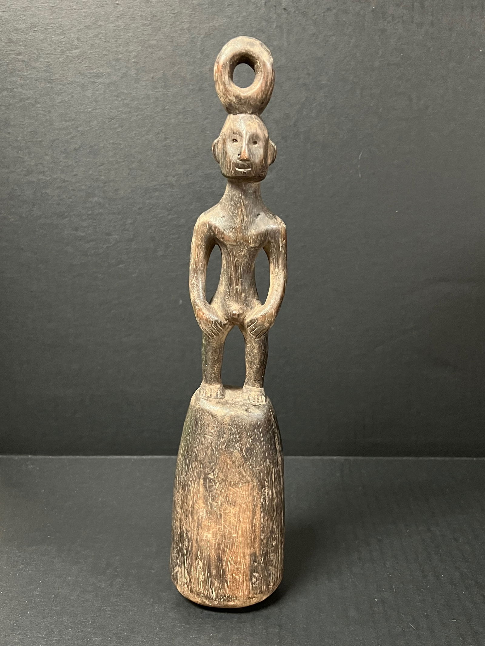 Philippine Tribal Art Carved Wood Bulul Pestle: Philippine Tribal Art Carved Wood Bulul Pestle. The dimension is 13.25 inches high x 3 inches wide. Please be aware that some of the items are vintage, secondhand, old ages, antiques and may have a