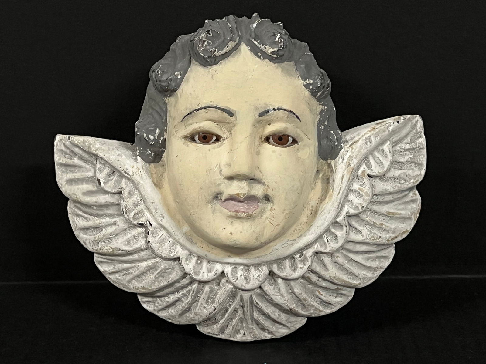 Carved Wood Cherub: Religious Art Carved Wood Cherub. The dimension is 6.5 inches high x 2.5 inches depth x 8 inches wide. Please be aware that some of the items are vintage, secondhand, old ages, antiques and may have