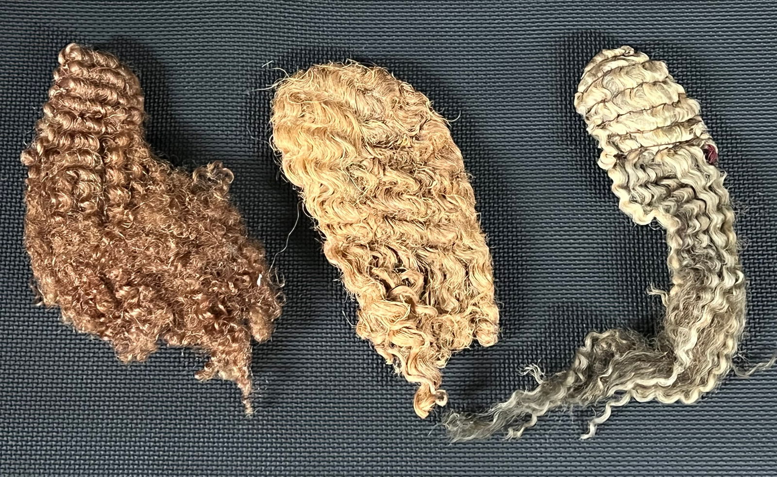 Artificial Hair of Saints 3 pieces: Religious Art Artificial Hair of Saints. The dimension is 9 inches long and 6 inches long. Please be aware that some of the items are vintage, secondhand, old ages, antiques and may have a defects or