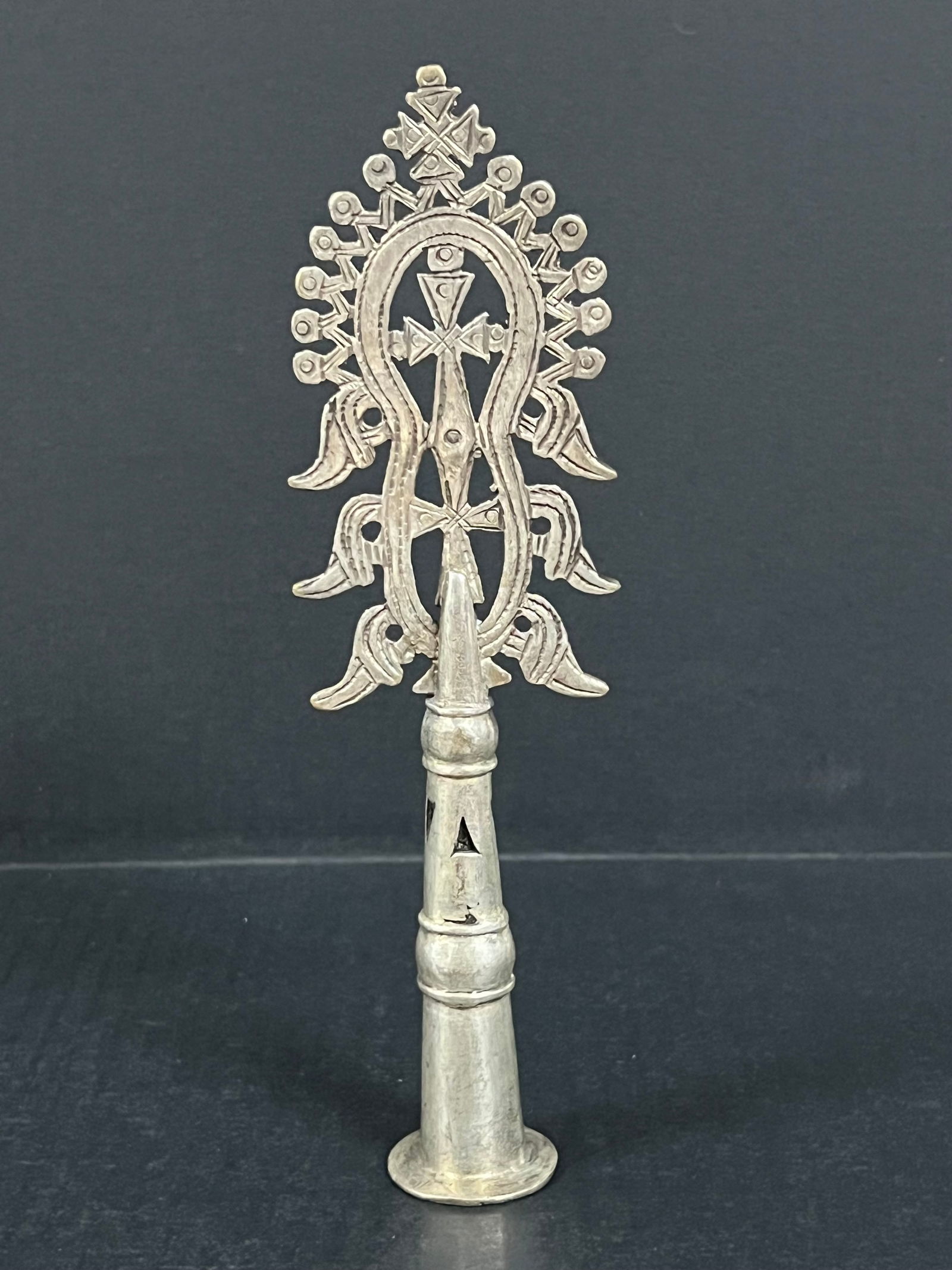 Ethiopian Metal Processional Coptic Cross: African Tribal Art Ethiopian Metal Processional Coptic Cross. The dimension is 8.75 inches high x 2.5 inches wide. Please be aware that some of the items are vintage, secondhand, old ages, antiques
