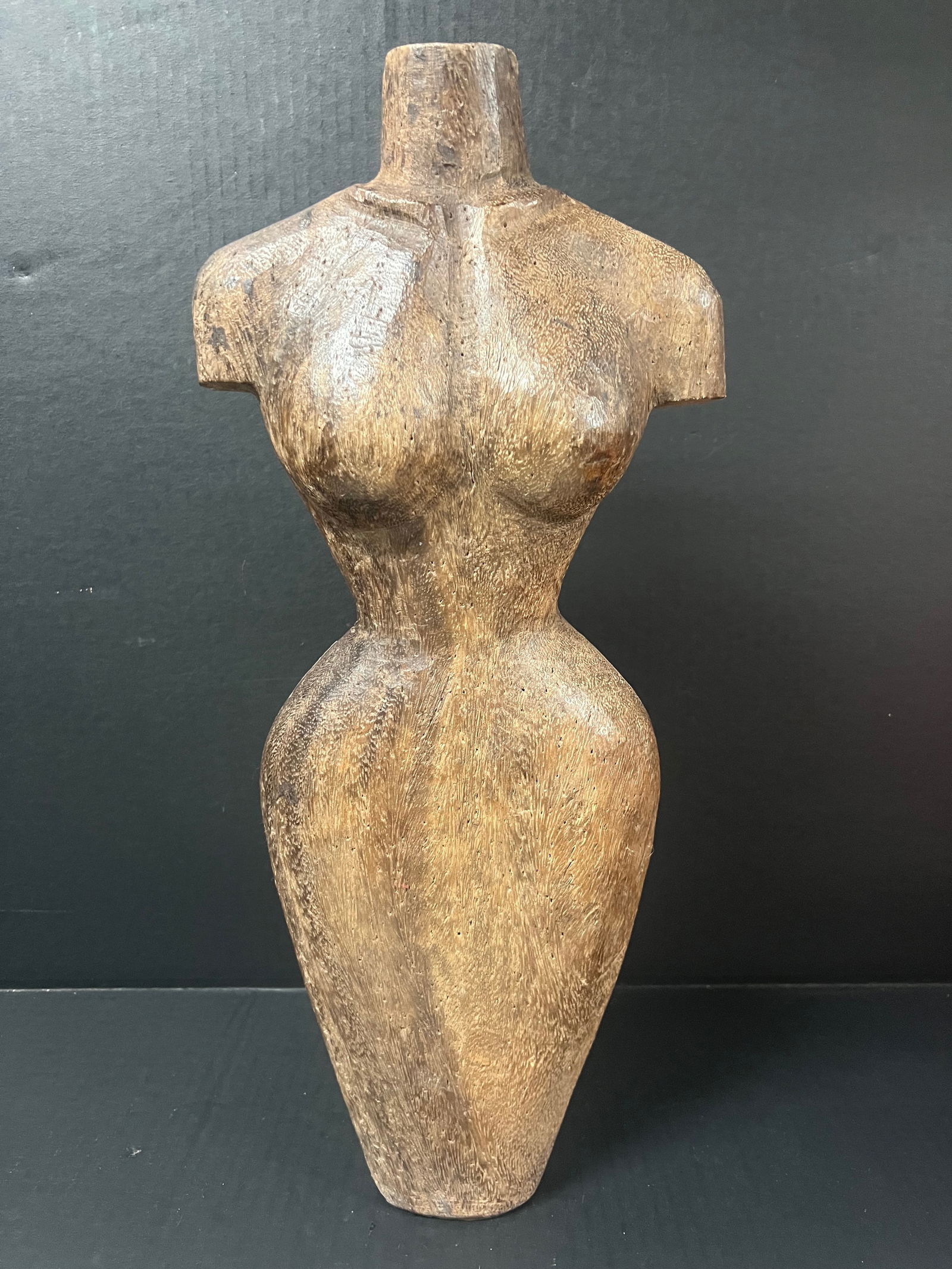 Carved Wood Female Torso Sculpture: Folk Art Carved Wood Female Torso Sculpture. The dimension is 19.5 inches high x 9 inches wide. Please be aware that some of the items are vintage, secondhand, old ages, antiques and may have a