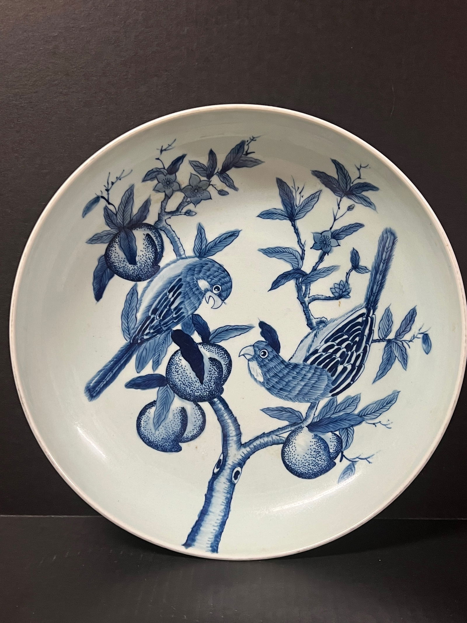 Porcelain Blue and White Charger Plates: Chinese Art Porcelain Blue and White Charger Plates with Floral and Love Bird Design. The dimension is 13 inches high x 13 inches wide. Please be aware that some of the items are vintage, secondhand,