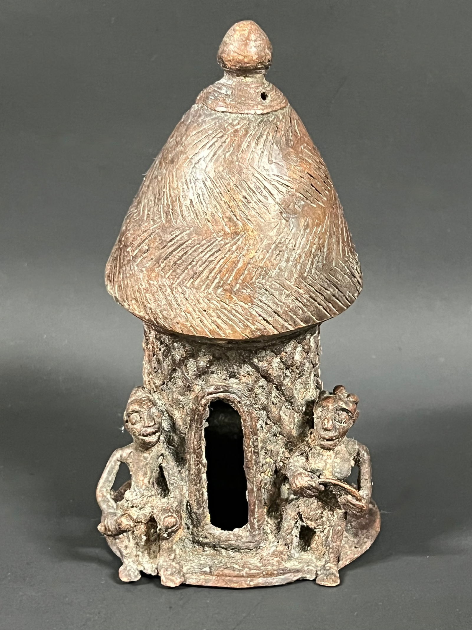 Benin Bronze House Sculpture: African Tribal Art Benin Bronze House Sculpture. The dimension is 6.5 inches high x 3.75 inches wide. Please be aware that some of the items are vintage, secondhand, old ages, antiques and may have a