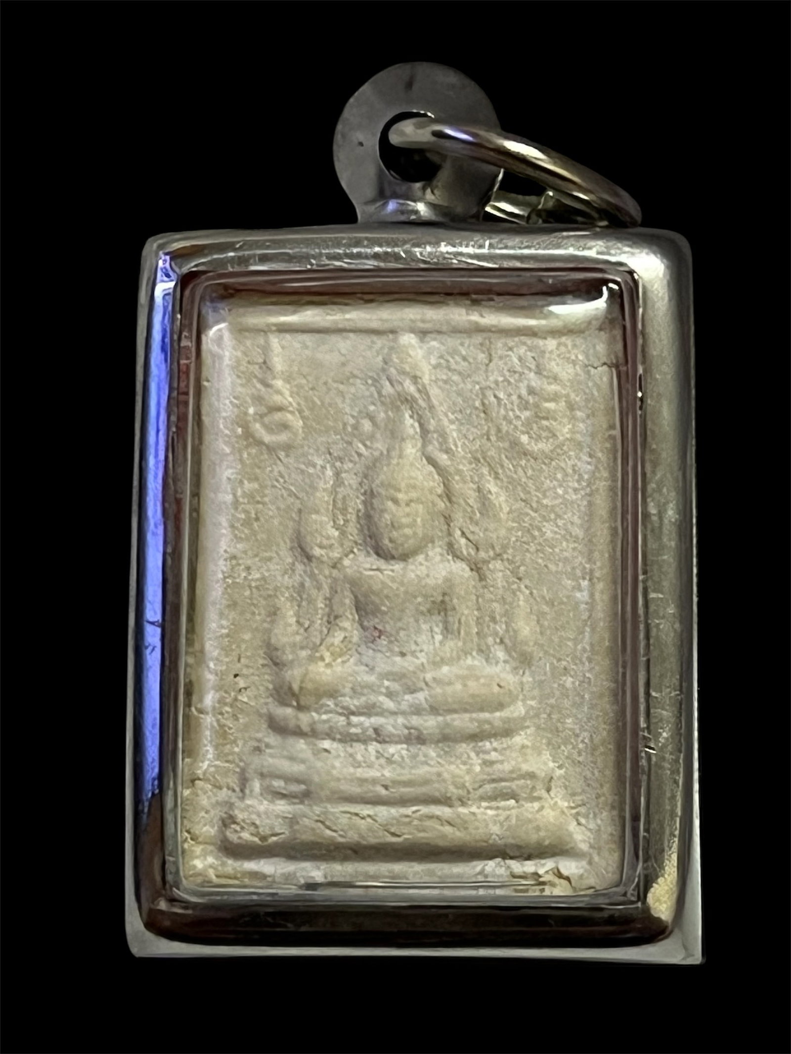 Southeast Asian Clay Buddha Amulet with Case: Southeast Asian Clay Buddha Amulet with Case. The dimension is 1.5 inches high x 1.5 inches wide. Please be aware that some of the items are vintage, secondhand, old ages, antiques and may have a defe
